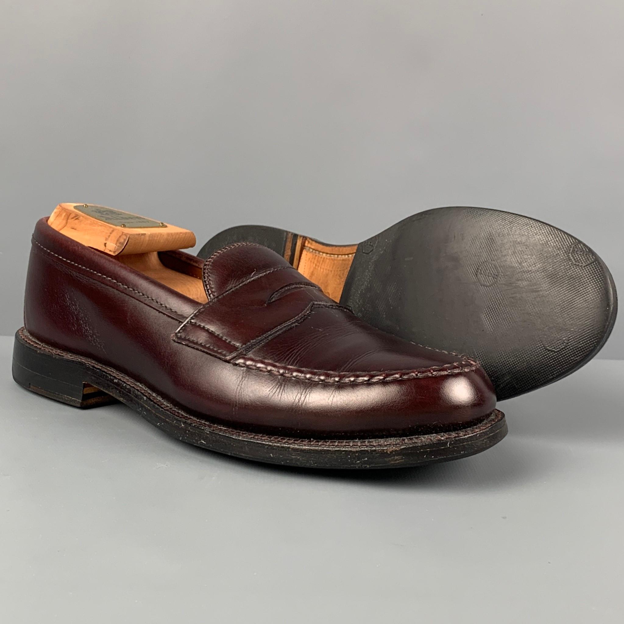 ALDEN loafers comes in a burgundy leather featuring a slip on style and a penny strap detail. Comes with box and shoes trees. Made in USA. 

Very Good Pre-Owned Condition.
Marked: 6.5 B/D 8C10 021 984

Outsole: 11 in. x 4 in. 