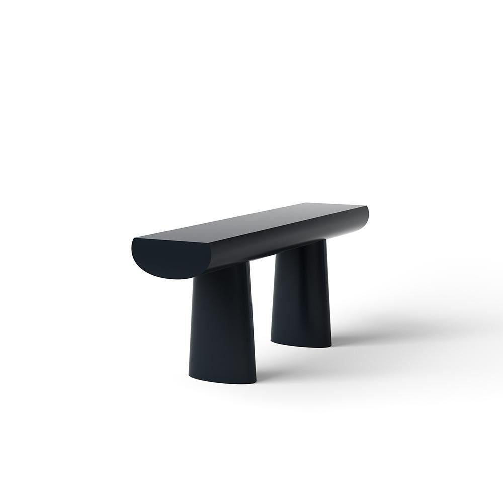 Console table designed by Aldo Bakker in 2017. 

Tranquil and seductive, Aldo Bakker’s Console Table floats exquisitely between sculpture and furniture. It depicts the simplest concept of a table: two columns and a surface. The legs are an