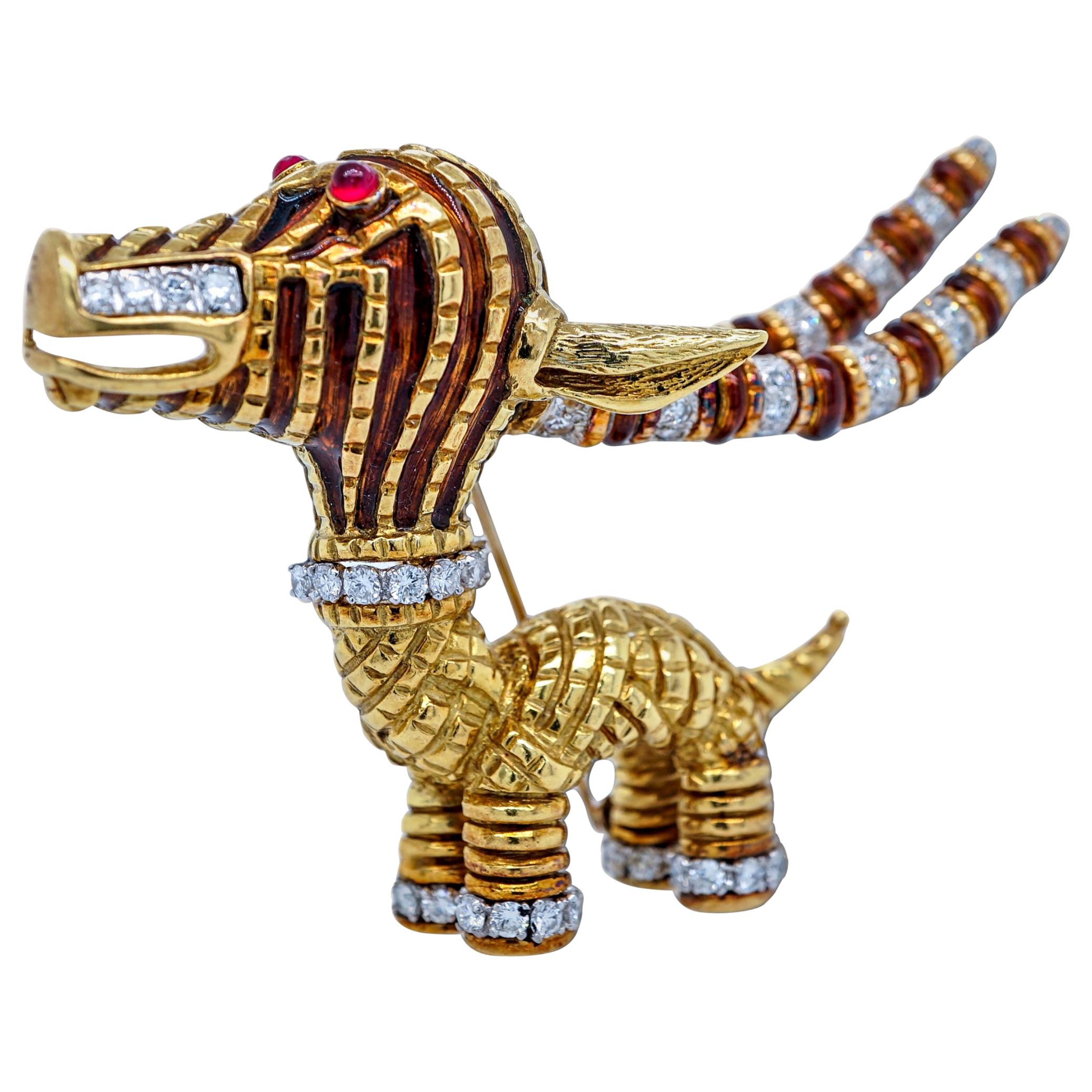 A gold, enamel and diamond brooch inspired by African art and ceremonial objects, designed by Also Cipullo for Tiffany & Co. in the late 1960s and offered by Select Antique Jewelry Inc.