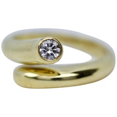 Vintage Aldo Cipullo 18 Karat Yellow Gold Cartier Single Diamond Wrap Around Ring