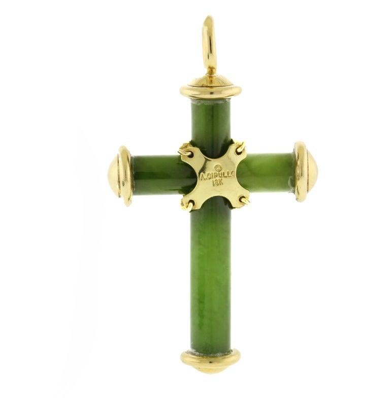 Aldo Cipullo 18k Yellow Gold & Nephrite Cross Pendant Vintage Circa 1970s

Here is your chance to purchase a beautiful and highly collectible designer pendant.  

Made by Italian designer Aldo Cipullo in the 1970s, this is an iconic and rare piece