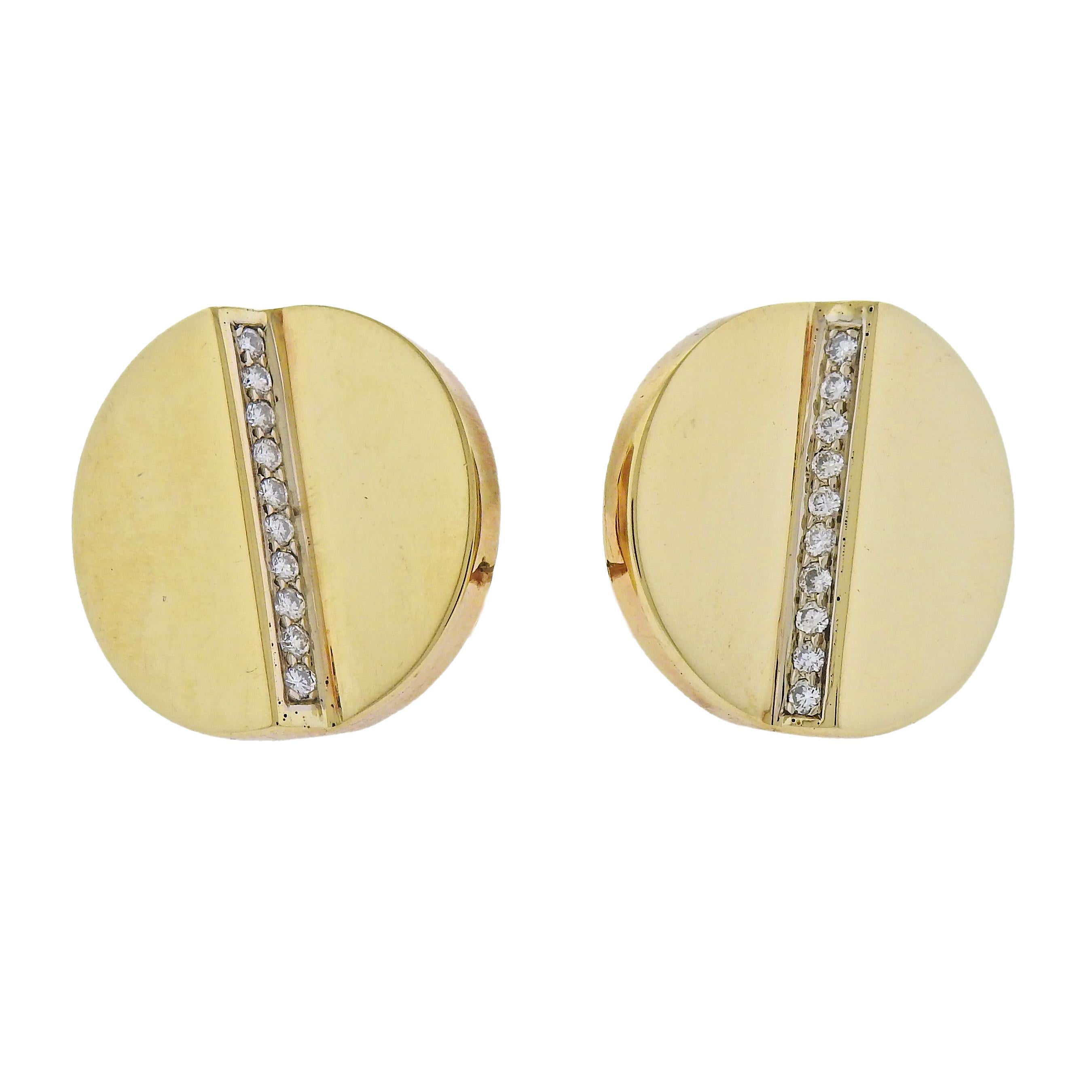 Pair of vintage 1970s 18k gold earrings by Aldo Cipullo, with approx. 0.40ctw in G/VS diamonds. Earrings are 22mm in diameter. Marked - Aldo Cipullo, 1974, 18k. Weight 12.7 grams. 

