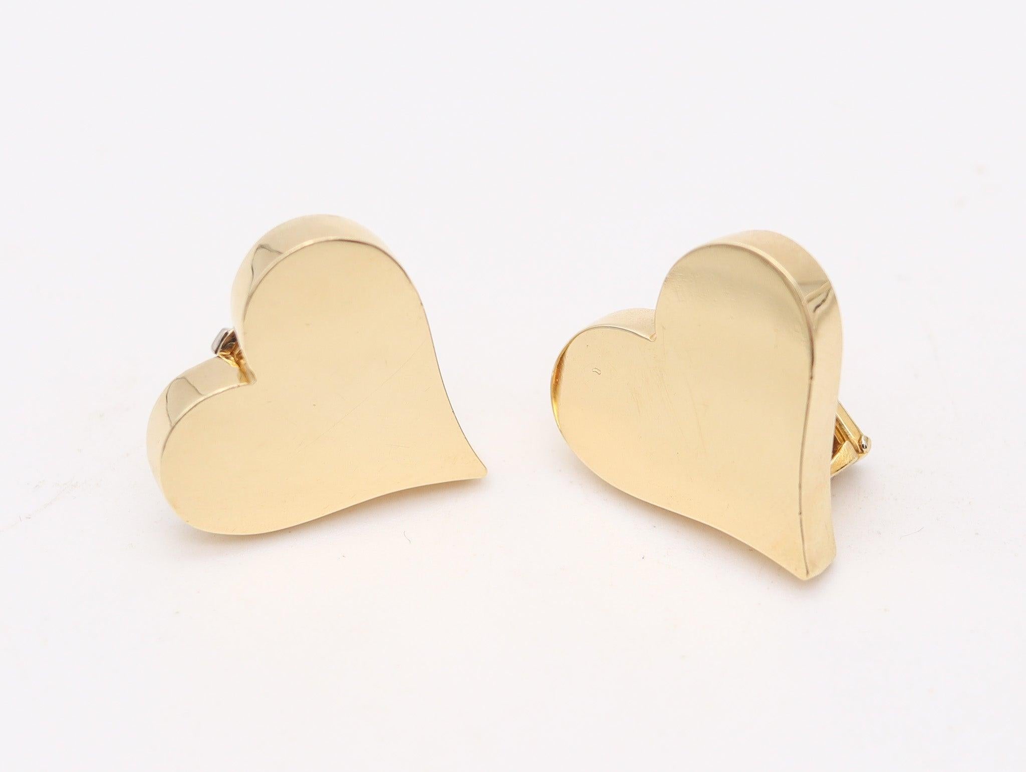 Modernista ALDO Cipullo 1972 Orecchini a clip in oro giallo massiccio 18Kt, giocosi come un cuore in vendita