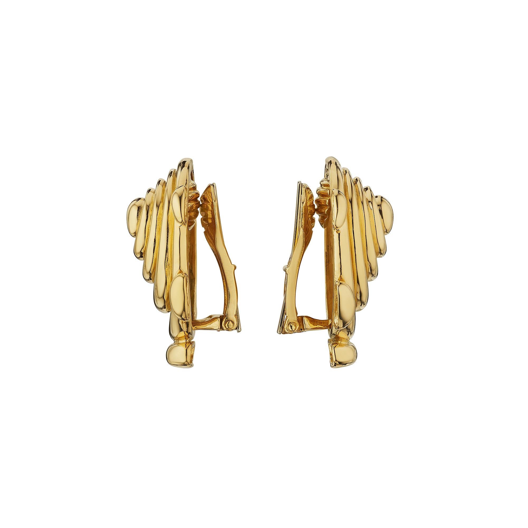 Take off with the speed of a 'Sputnik' with these Aldo Cipullo for Cartier modernist 18 karat yellow gold clip earrings.  Circa 1970-75.  Signed A. Cipullo.  1