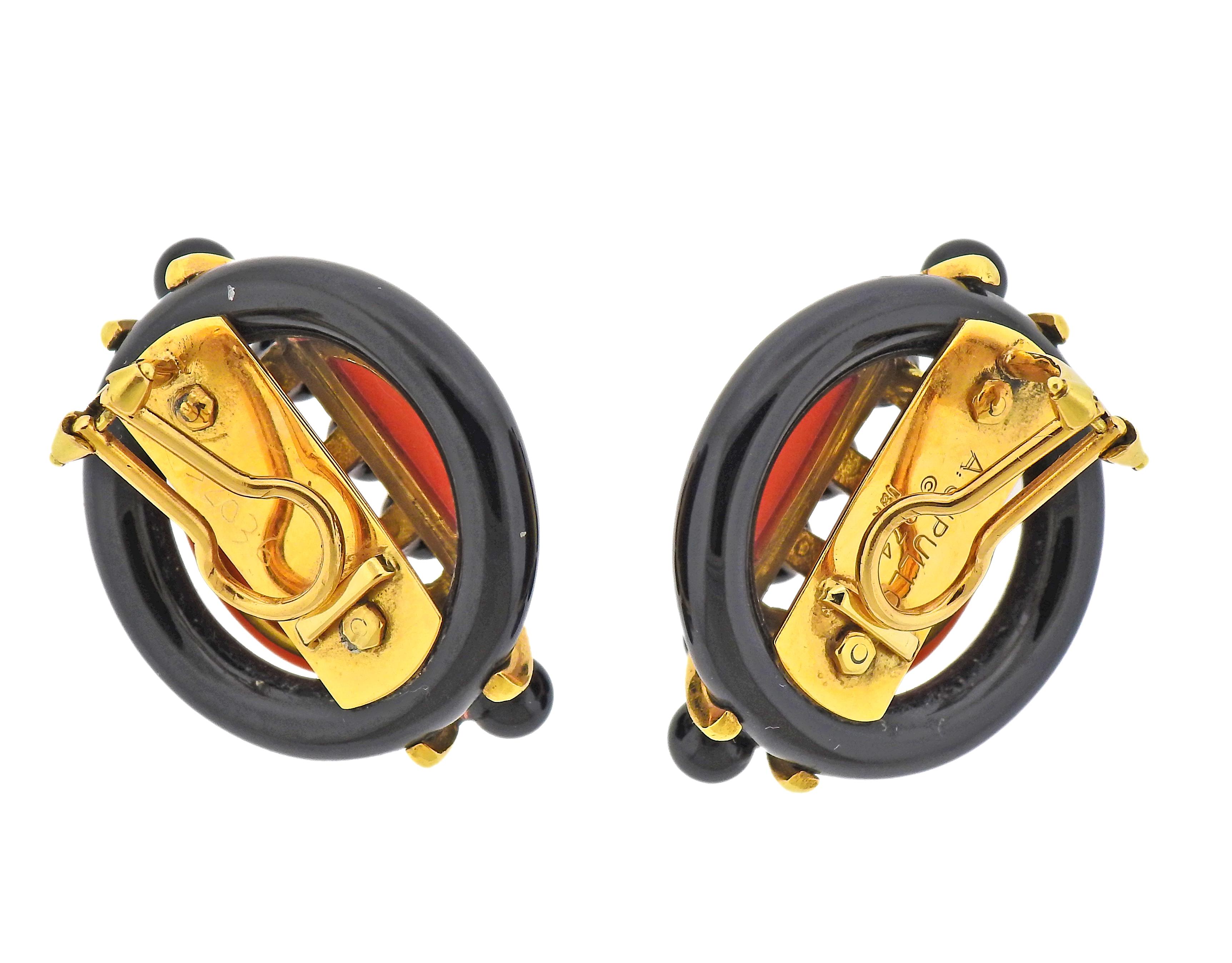 Pair of large 18k gold earrings by Aldo Cipullo, crafted in 1974, with onyx and coral. Earrings measure 35mm x 29mm. Marked: A.Cipullo, 18k, 1974, 32036. Weight - 35.4 grams.