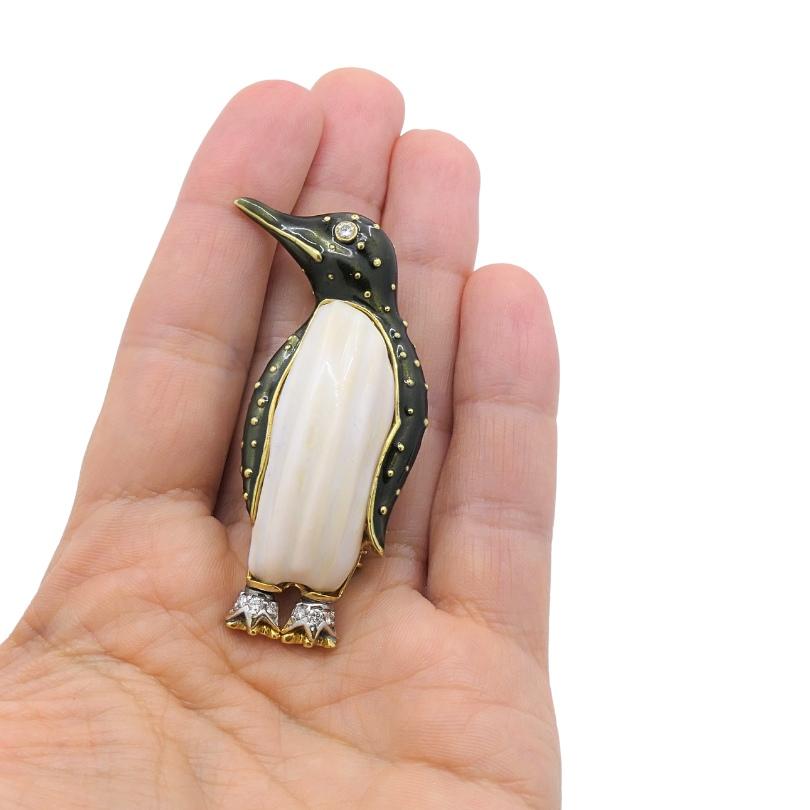 Designer: Aldo Cipullo for Cartier
Materials: 18 karat Yellow Gold, Enamel
Weight: 34 grams
Gemstone: Diamond
Measurement: 2 3/8