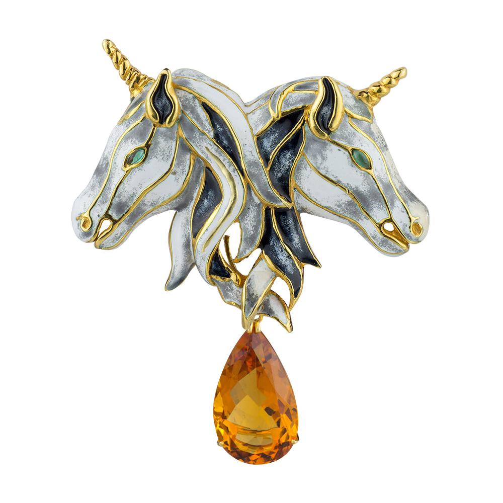 A 1974 gold, enamel and citrine brooch by Aldo Cipullo, offered by Vendome Collection Inc. 