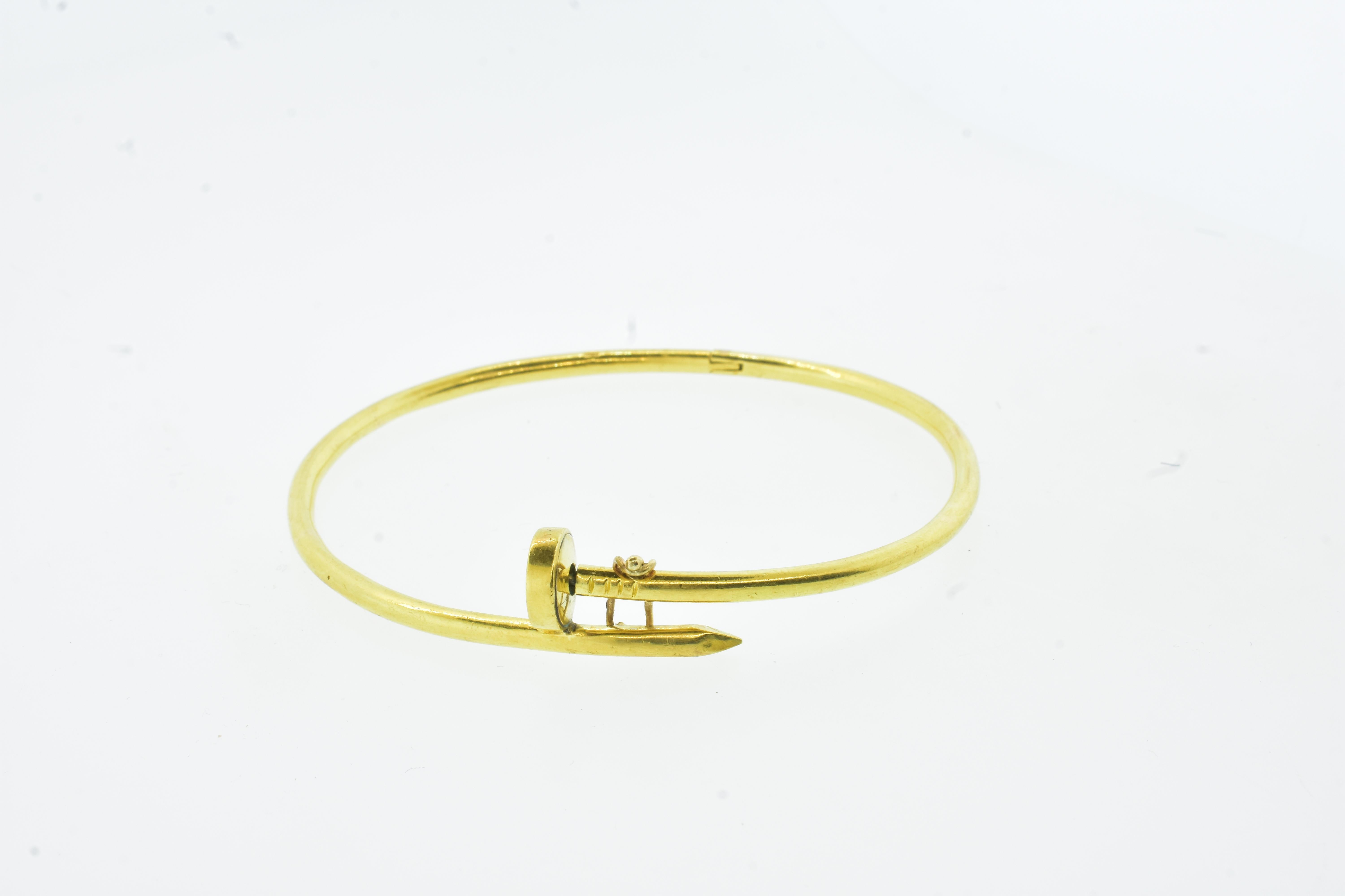 
This bracelet was made the same year that Aldo Cipullo release, over 50 years ago,  this - his newest design for Cartier. Early Juste un Clou bracelets by Aldo Cipullo are quite rare. Ours is engraved Aldo Cipullo, 1971.  The 18K yellow gold