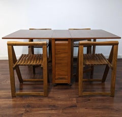 Aldo Jacober - Tavolo Foldes a ribalta con 4 sedie di Alberto Bazzani