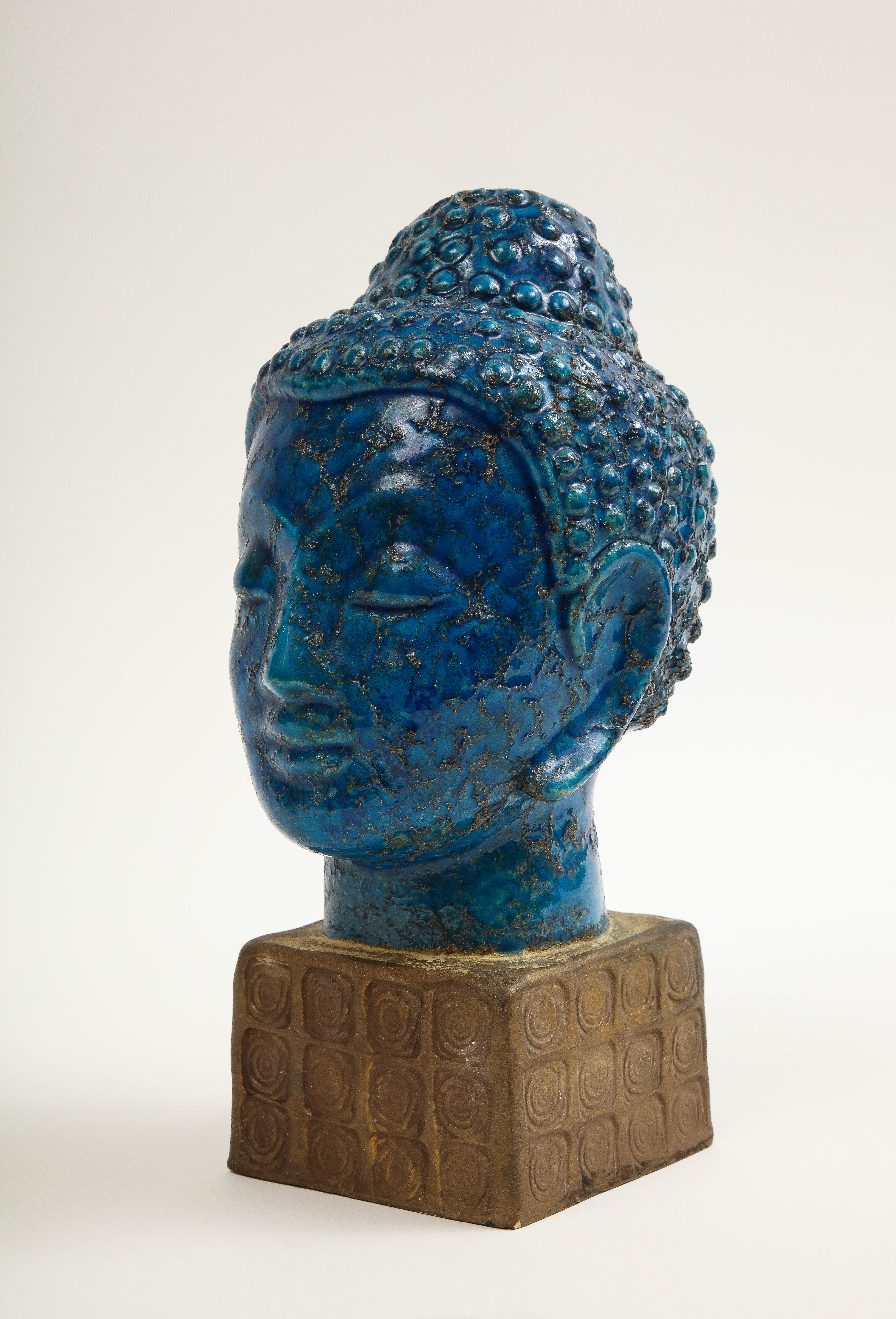 Aldo Londi Bitossi Buddha bust, ceramic, blue, gold, Rosenthal Netter, signed. Medium scale Buddha bust from Aldo Londi's Cinese series. The Buddha's face is glazed in a textured royal blue with its hair and ushnisha glazed in a slightly lighter