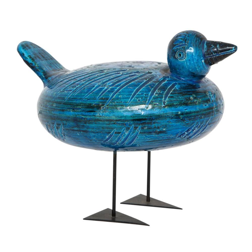 Raymor Bitossi Duck Ceramic Rimini Blue Signed. Rare Aldo Londi designed ceramic duck with a darker than usually seen glaze. Supported by two black steel rods that attach to triangular feet. Signed 1702 B Italy. Retains original label: 27338 BIT