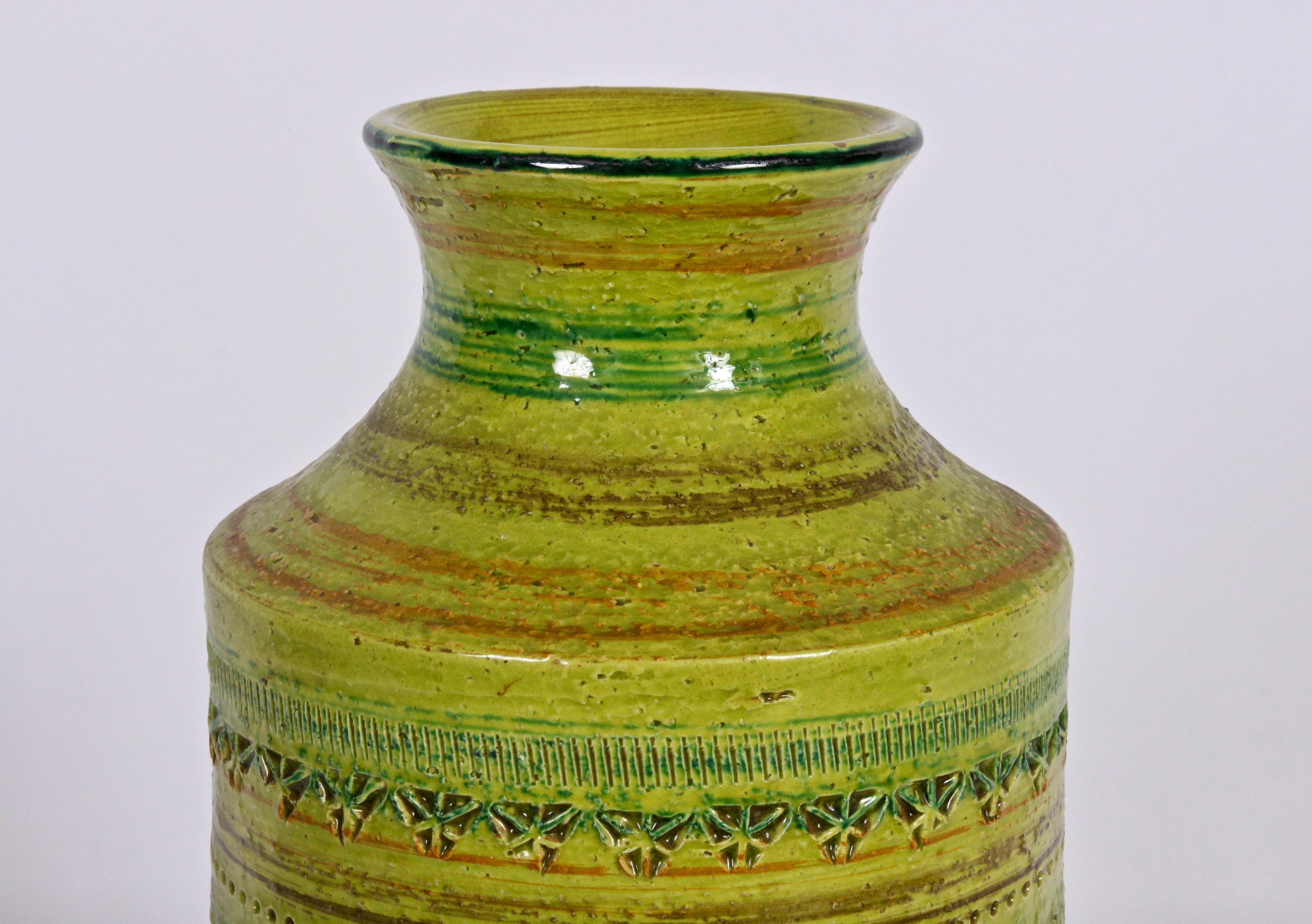 Tall Aldo Londi Bitossi for Rosenthal Netter hand imprinted glazed vessel in chartreuse, earthen brown with orange highlights. Natural. Organic. Hand crafted. Label to underside partially visible. Never used with liquid. Pristine condition.
 