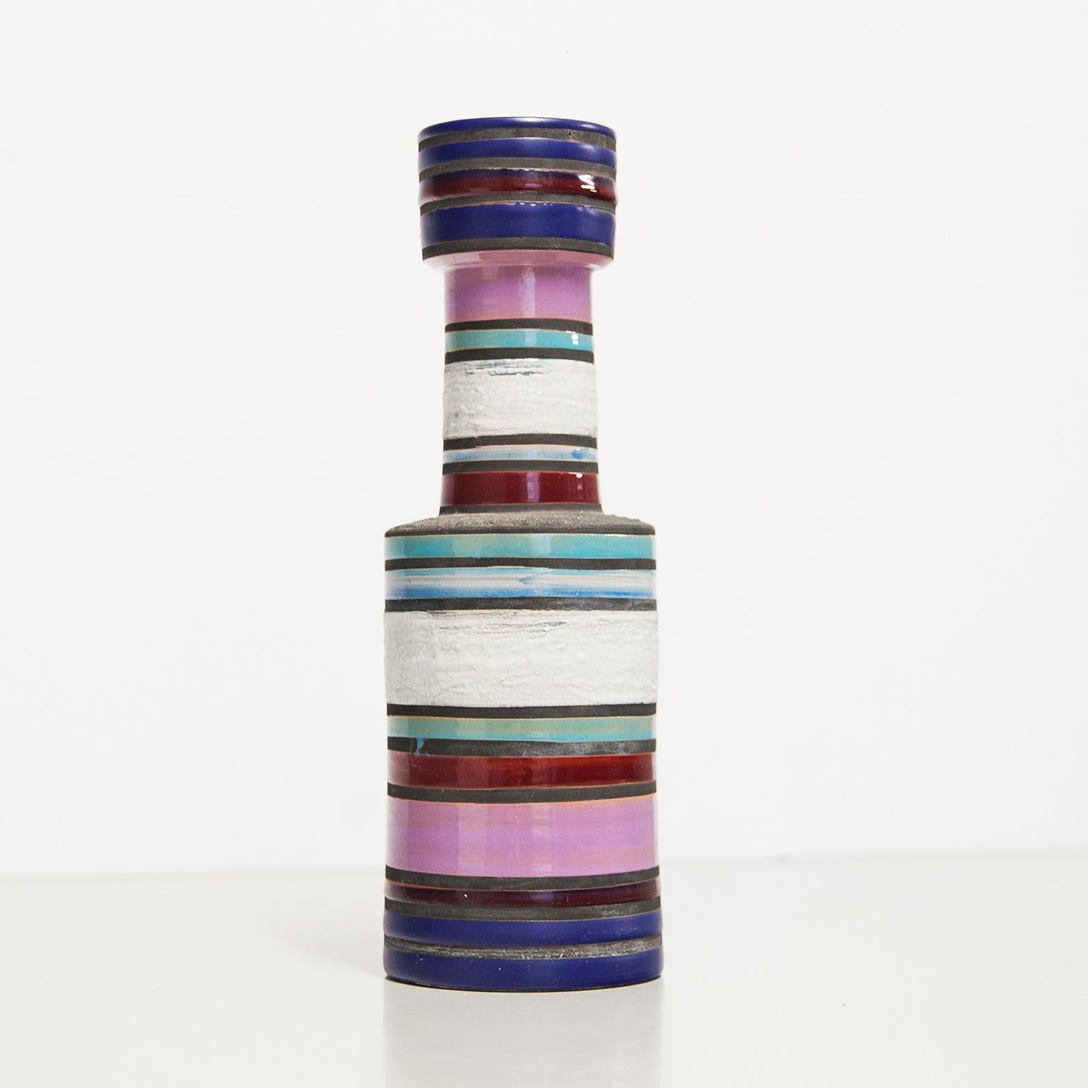 Aldo Londi Bitossi Raymor ceramic vase stripes pottery signed, Italy, 1960s, stoneware Cambogia vase in vibrant bands of turquoise, violet, pink, light and dark blue and a textured black. Signed beneath the glaze on the underside.

