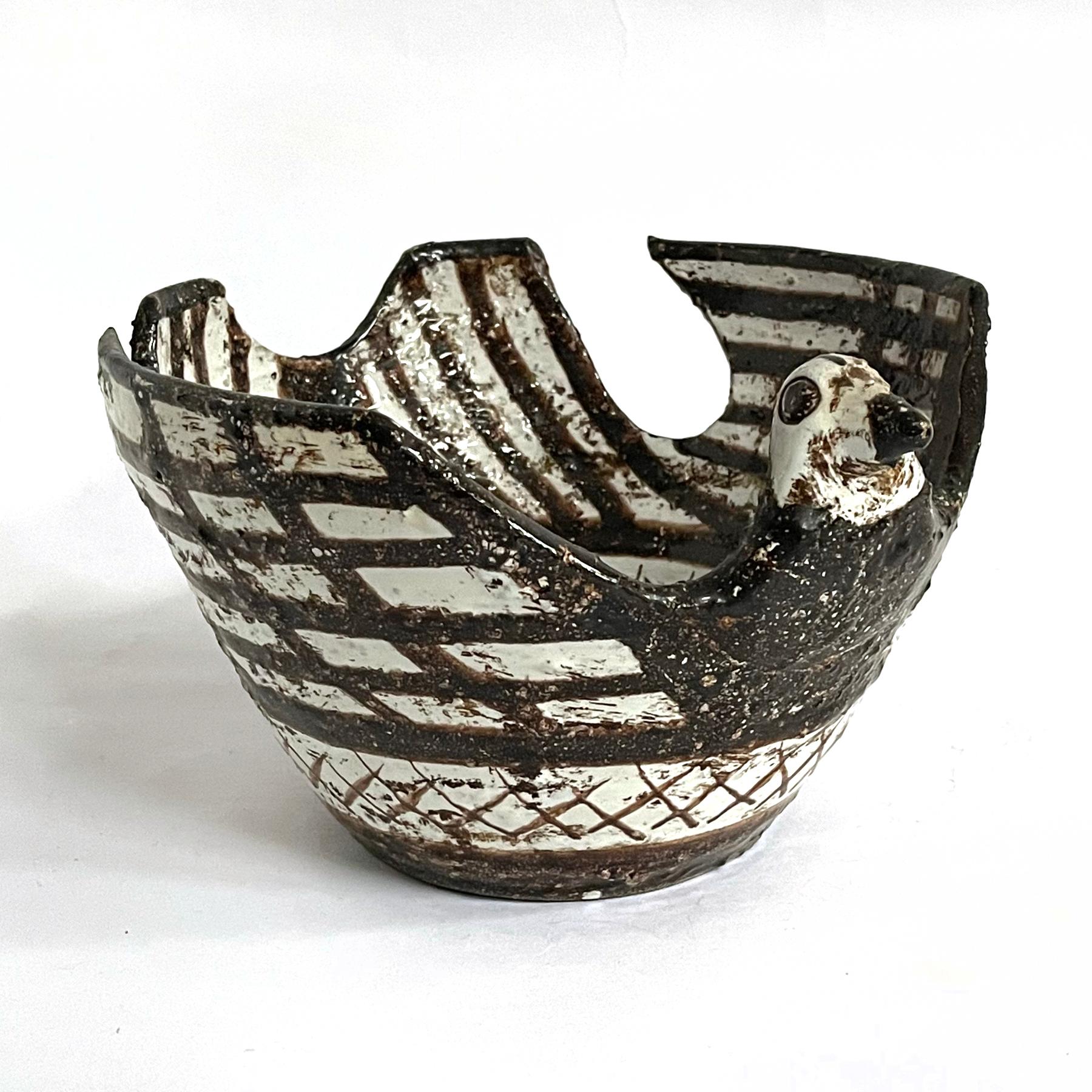 As design director for Bitossi for over fifty years, artist Aldo Londi created a unique aesthetic combining traditional, folk art, and contemporary aesthetics into a signature sensibility.

This bird shaped bowl from the 