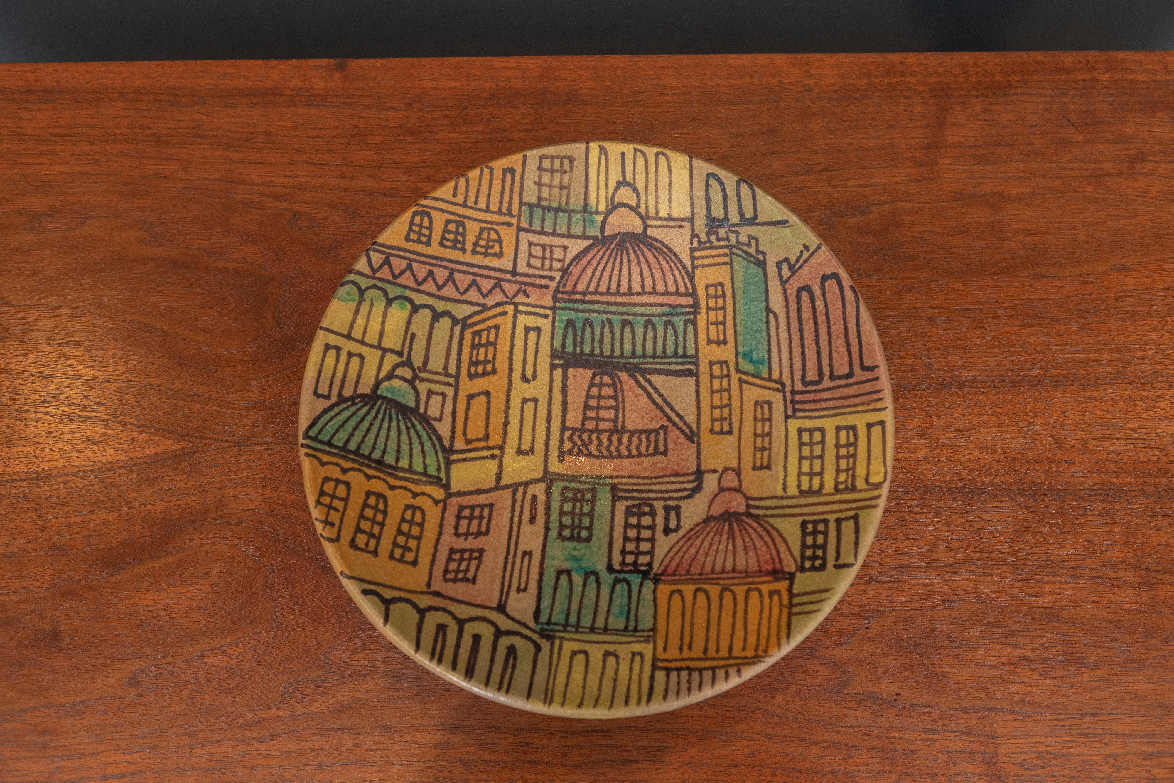 Aldo Londi design decorative ceramic centerpiece bowl for Bitossi, Italy. 
Fun scene depicting rooftops of Rome, Italy? Well executed and in very good original condition free of chips, cracks or stains.