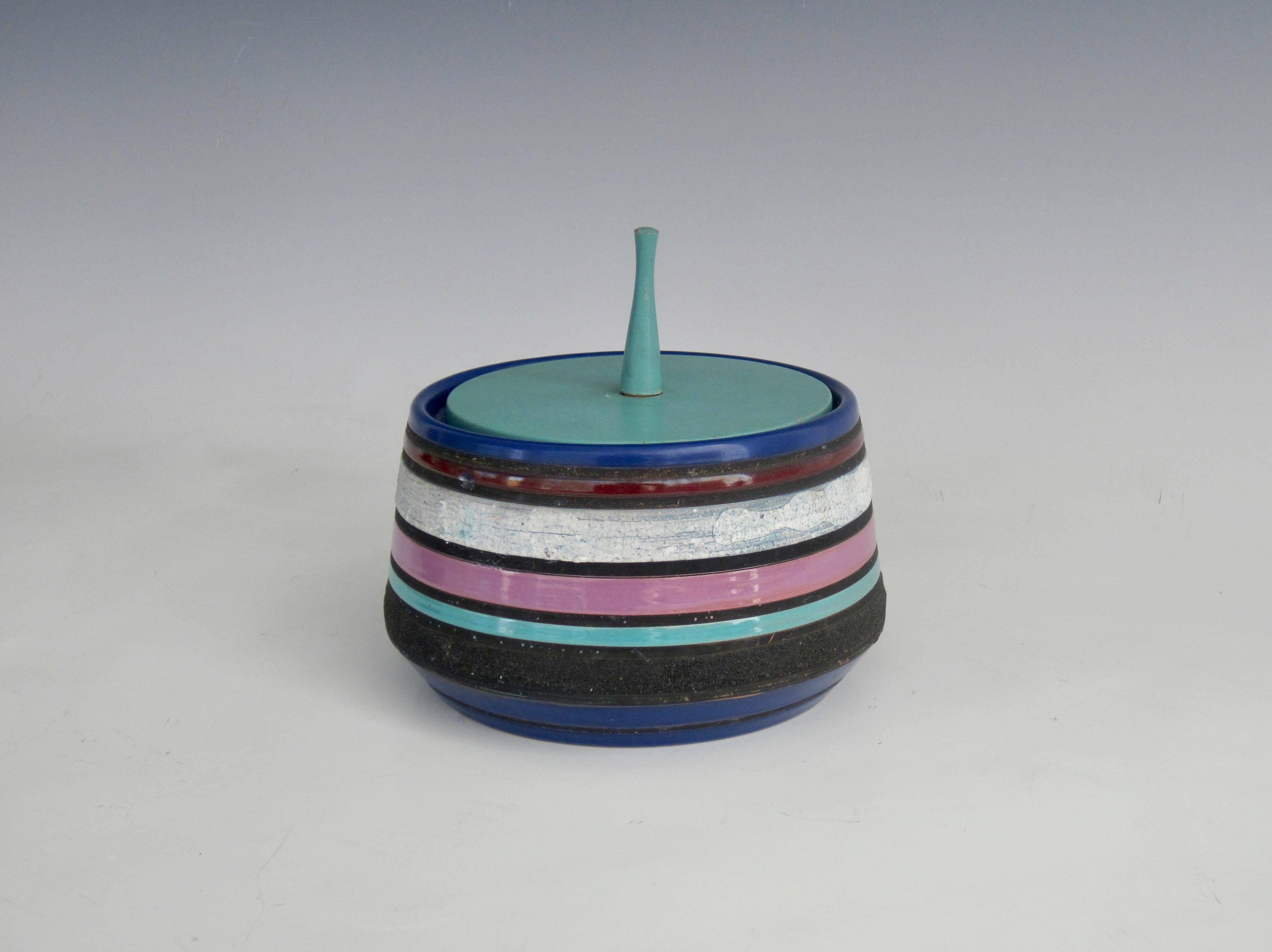 Aldo Londi for Bitossi Cambogia Series jar with alternating horizontal stripes of various glazes and textures with an aqua painted wooden lid. From the 1950s. The last photo shows it paired with a tall cylindrical vase from the same Cambogia Series