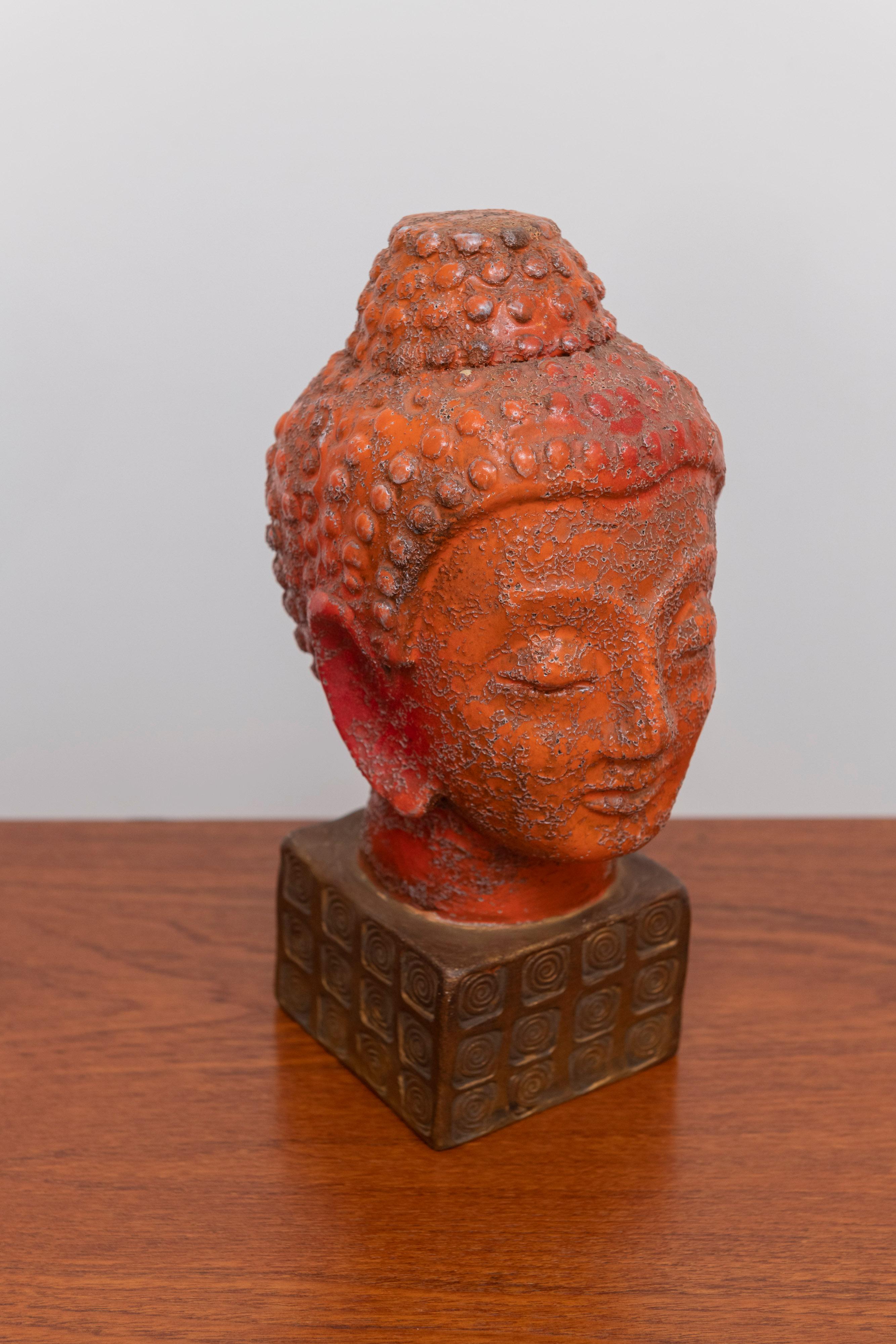 Aldo Londi Bitossi Buddha bust, ceramic, orange, gold, Rosenthal Netter, signed. Medium scale Buddha bust from Aldo Londi's Cinese series. The Buddha's face is glazed in a textured orange with its a hair and ushnisha glazed in a slightly lighter