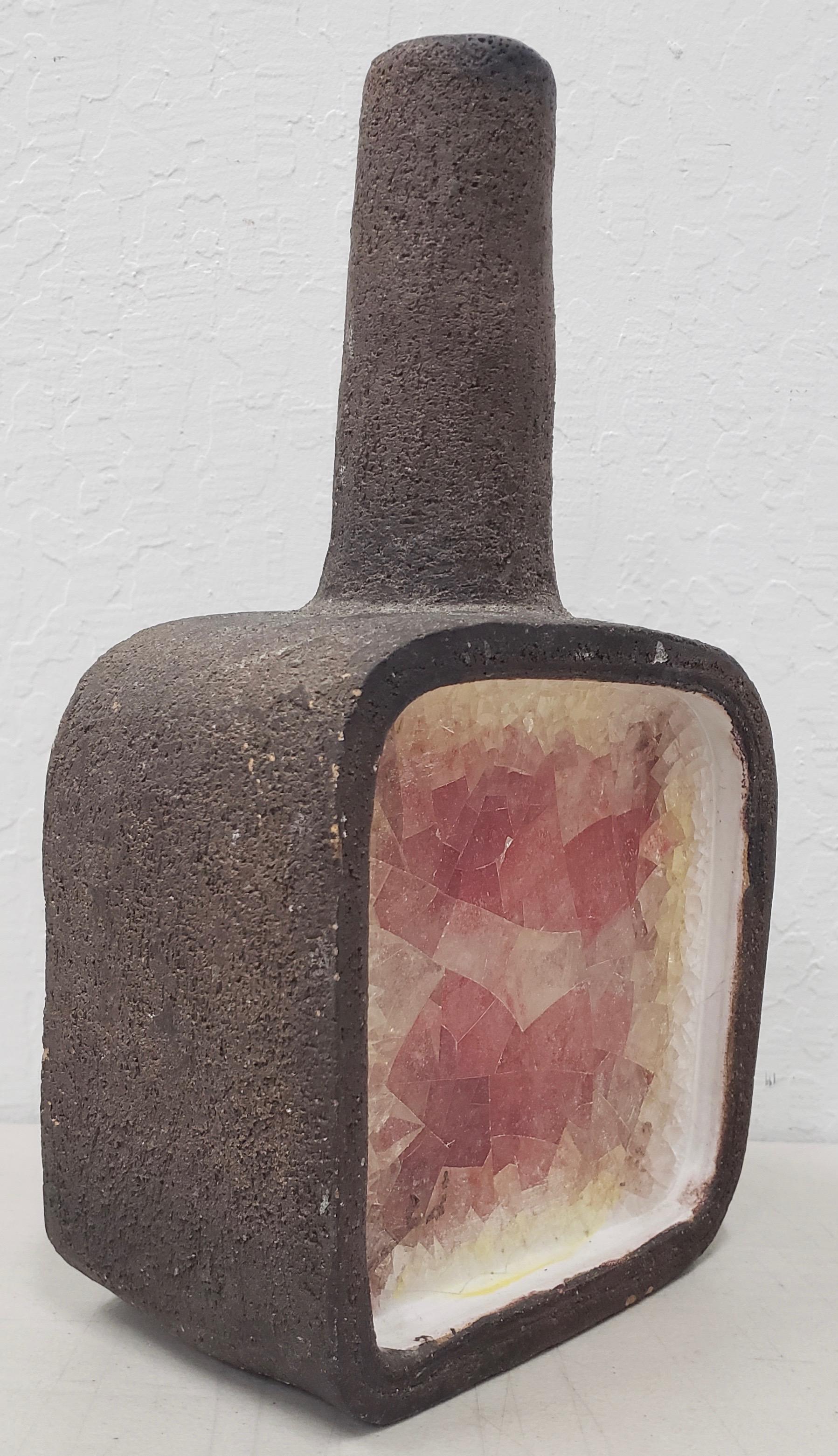 Aldo Londi for Bitossi ceramic and fused glass pottery vase, circa 1950s

Rare ceramic vase with glass front by Italian designer Aldo Londi for Bitossi.

Dimensions 7