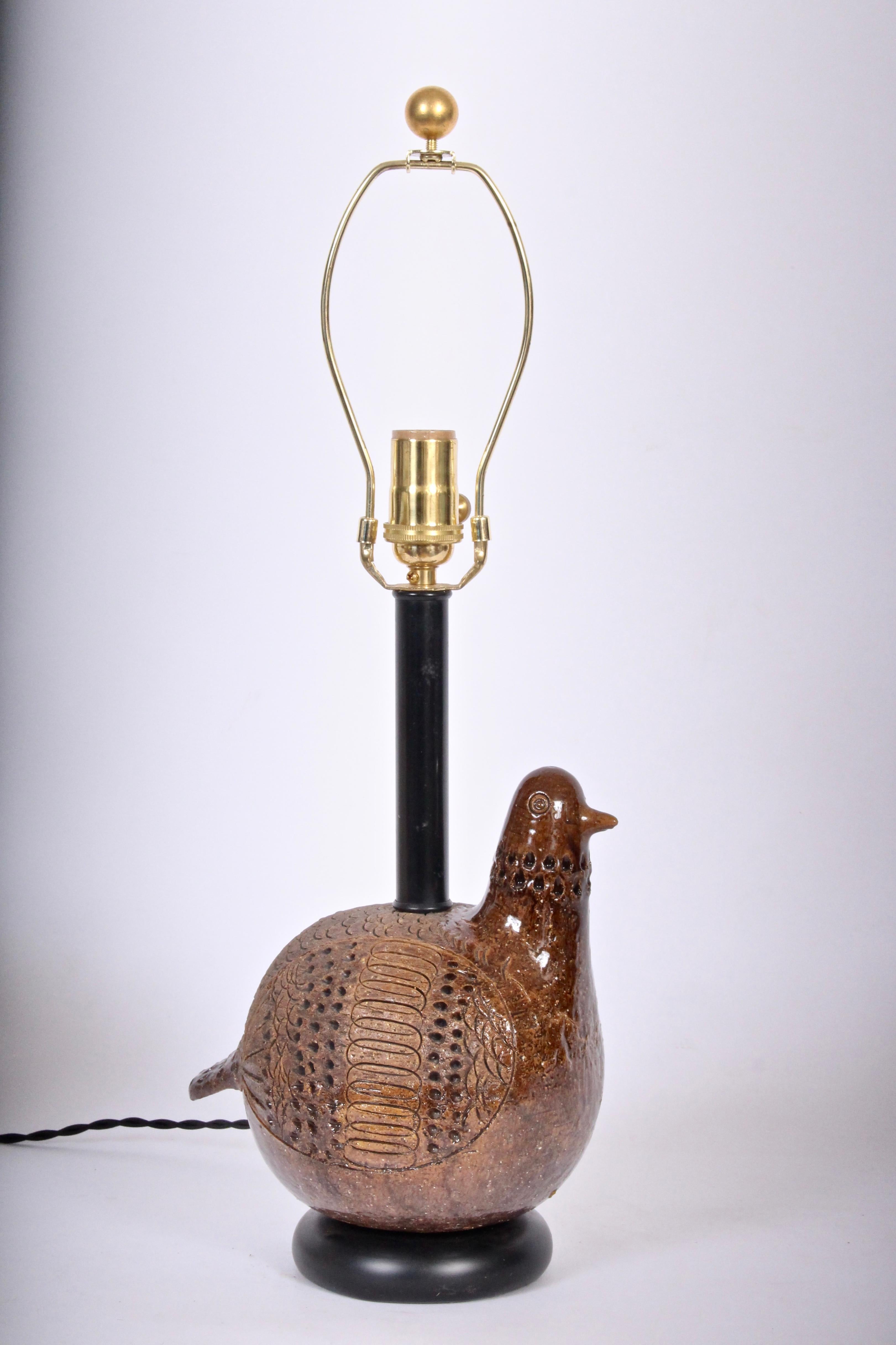 Handcrafted Aldo Londi for Bitossi Incised Earthen Partridge Glazed Ceramic Table Lamp. Handcrafted bird form in Brown clay with partial gloss glaze highlighted with original Black neck and base. 16 H to top of socket. Shade shown for display only