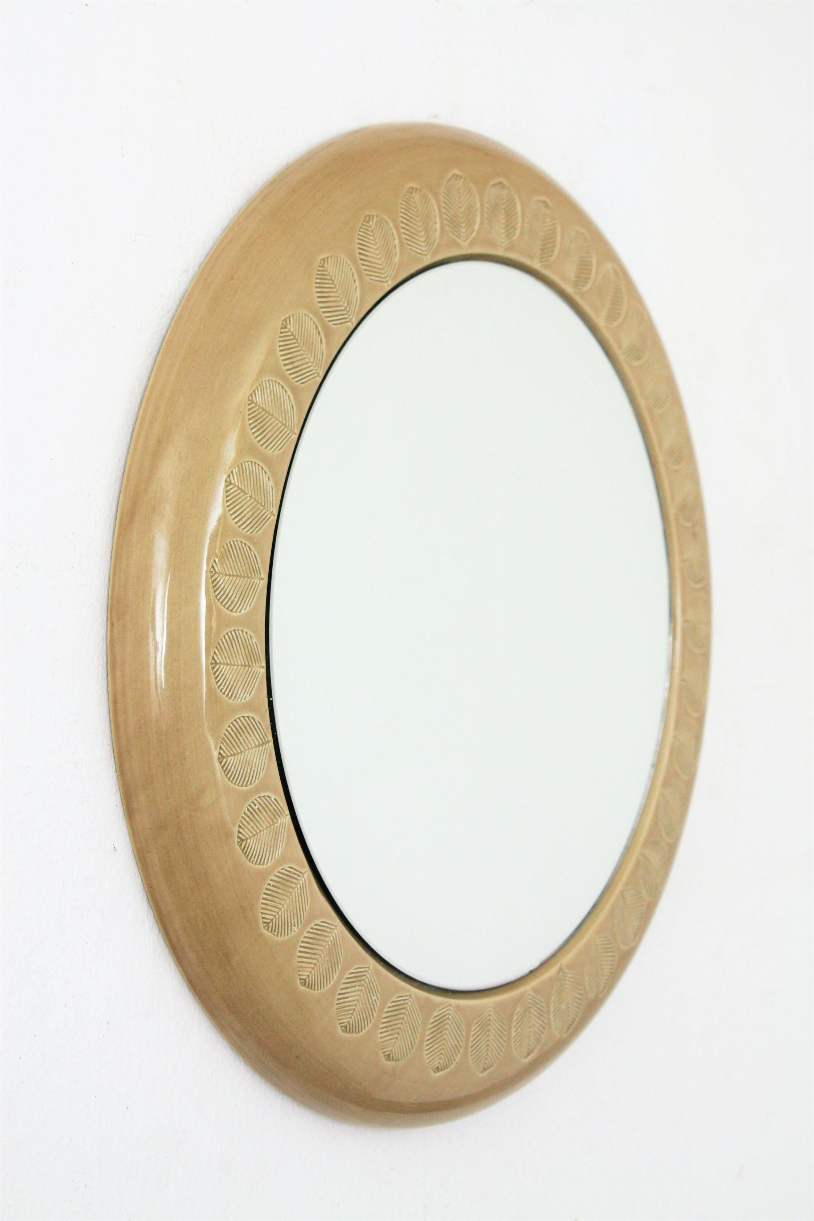 Italian Aldo Londi Bitossi Beige Glazed Ceramic Round Wall Mirror with Leaf Motifs For Sale