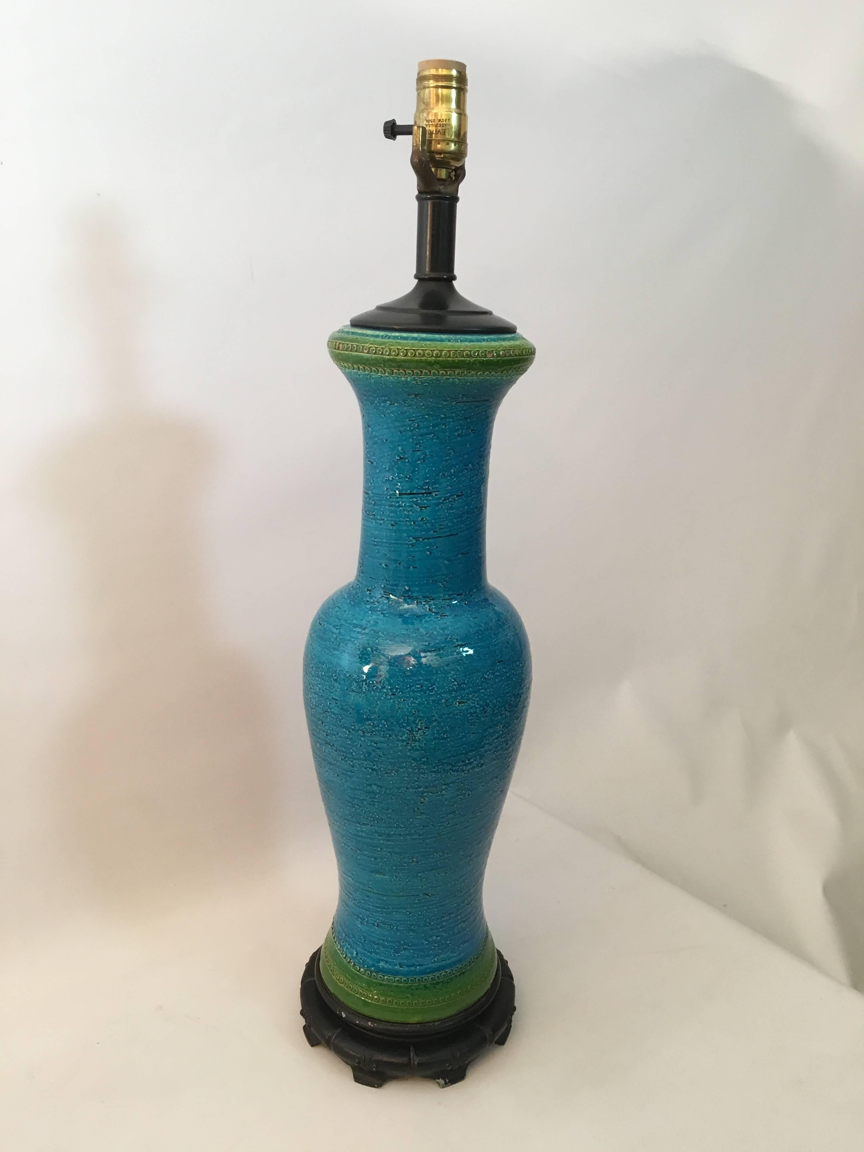 Tall and beautiful turquoise blue with green ring glazed pottery lamp by Aldo Londi for Bitossi. The pottery measures 20