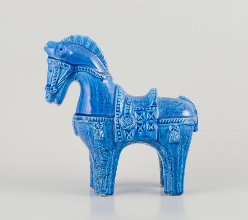 Mid-Century Modern Aldo Londi for Bitossi, Italy. Ceramic figurine of a horse in azure blue glaze.