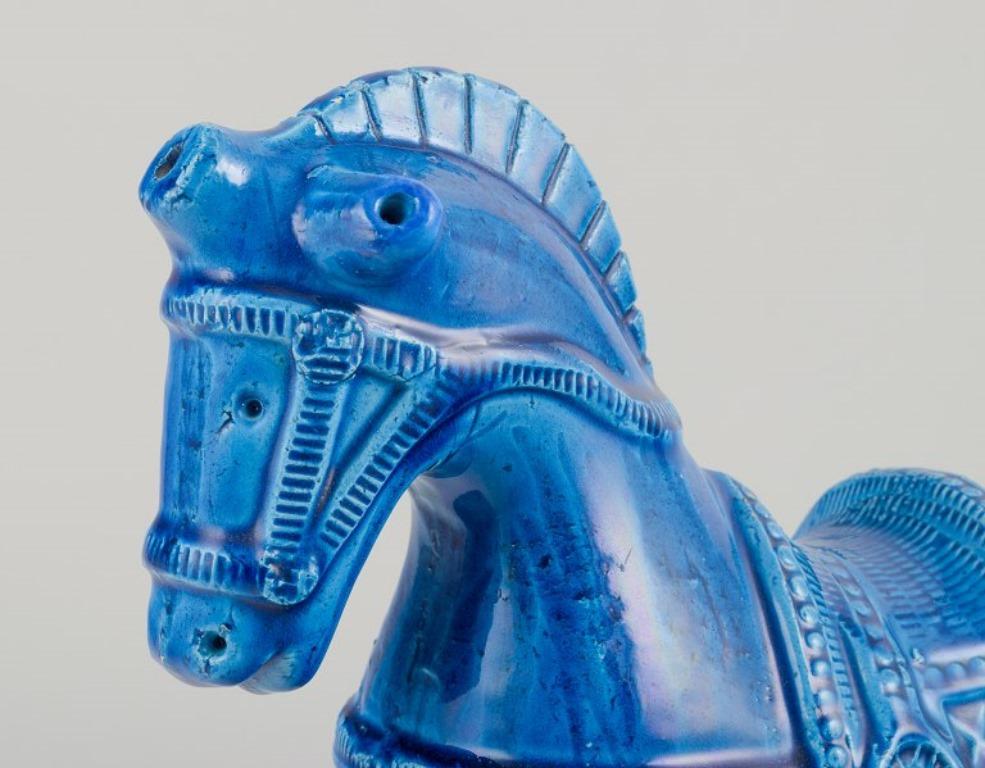 Italian Aldo Londi for Bitossi, Italy. Ceramic figurine of a horse in azure blue glaze.