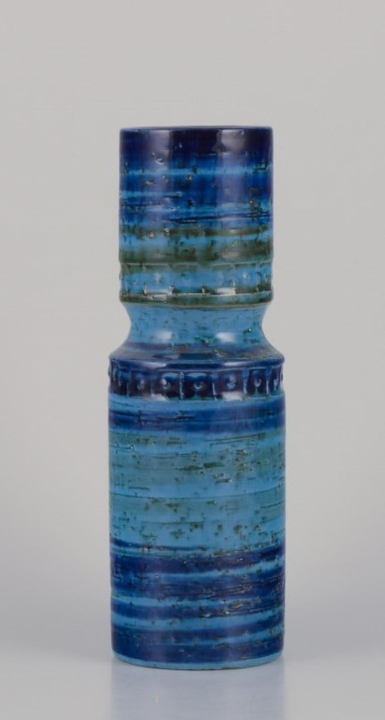 Aldo Londi (1911–2003) for Bitossi, Italy. 
Ceramic vase with green and blue glaze in a geometric pattern.
Approximately from the 1970s.
Marked.
In perfect condition.
Dimensions: Height 25.3 cm x Diameter 7.0 cm.