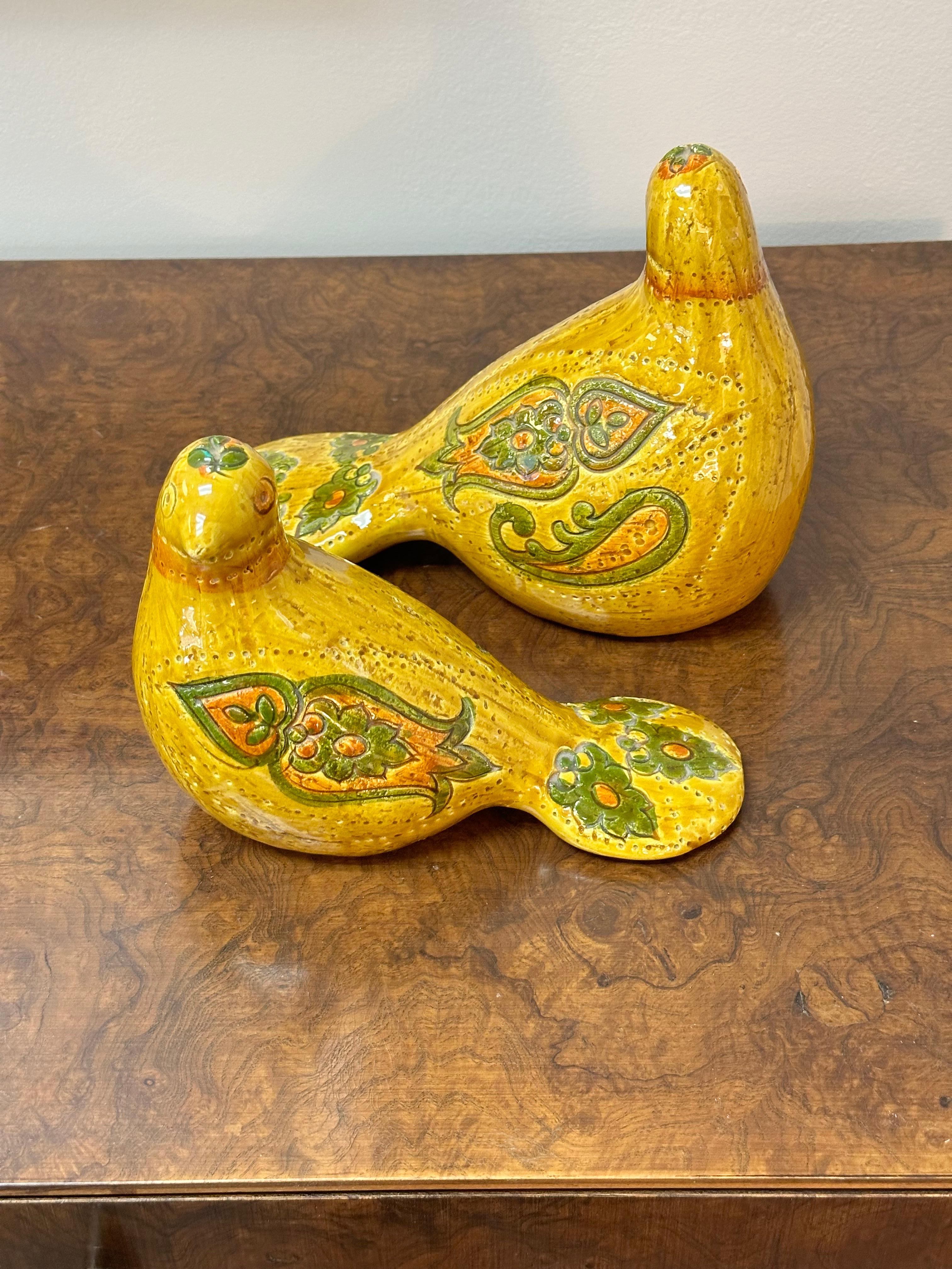Aldo Londi for Bitossi Pottery Doves, a pair (imported by Rosenthal Netter)

A beautiful vintage pair of mustard yellow stoneware doves designed by Italian ceramist Aldo Londi (1911-2003) for Bitossi. Made in Italy and imported to the US by