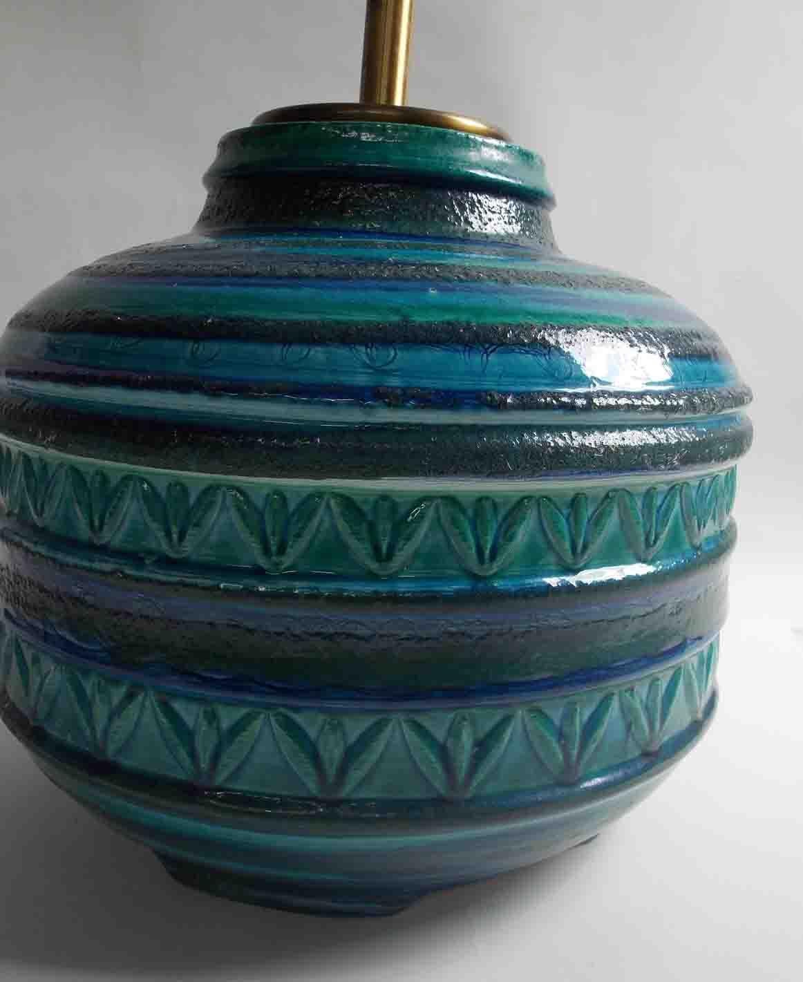 A large scale lamp, covered in Rimini blue glaze featuring incised Sgraffito decoration.