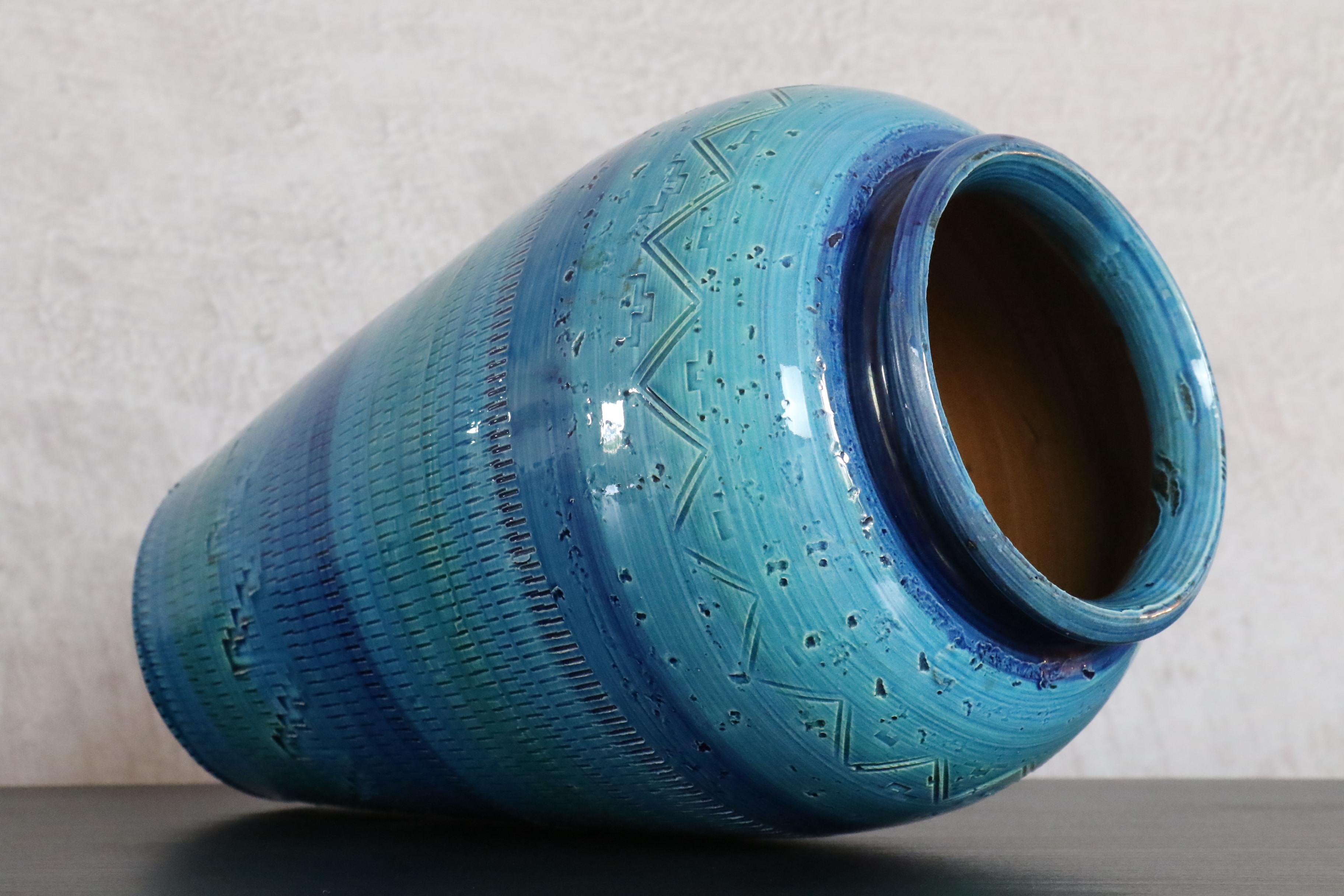 Aldo Londi Terracotta Ceramic Rimini Blue large vase for Bitossi, Italy. 

This large vase was designed by Aldo Londi in Italy during 1960s.
Blue, pale green and turquoise terracotta ceramic are glazed by hand with a geometric design carved. 
This