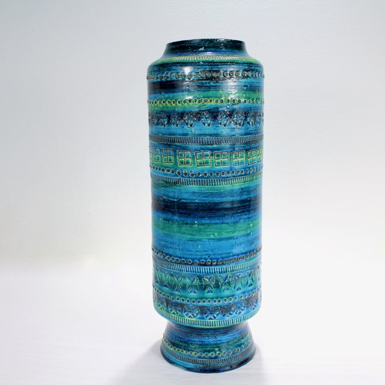 A fine mid-century Rimini blue pottery vase. 

By Aldo Londi for Raymor.

Made in Londi's renowned Rimini Blue style, the vase has a rich blue glaze with green undertones and is covered throughout in intricate & abstract geometric