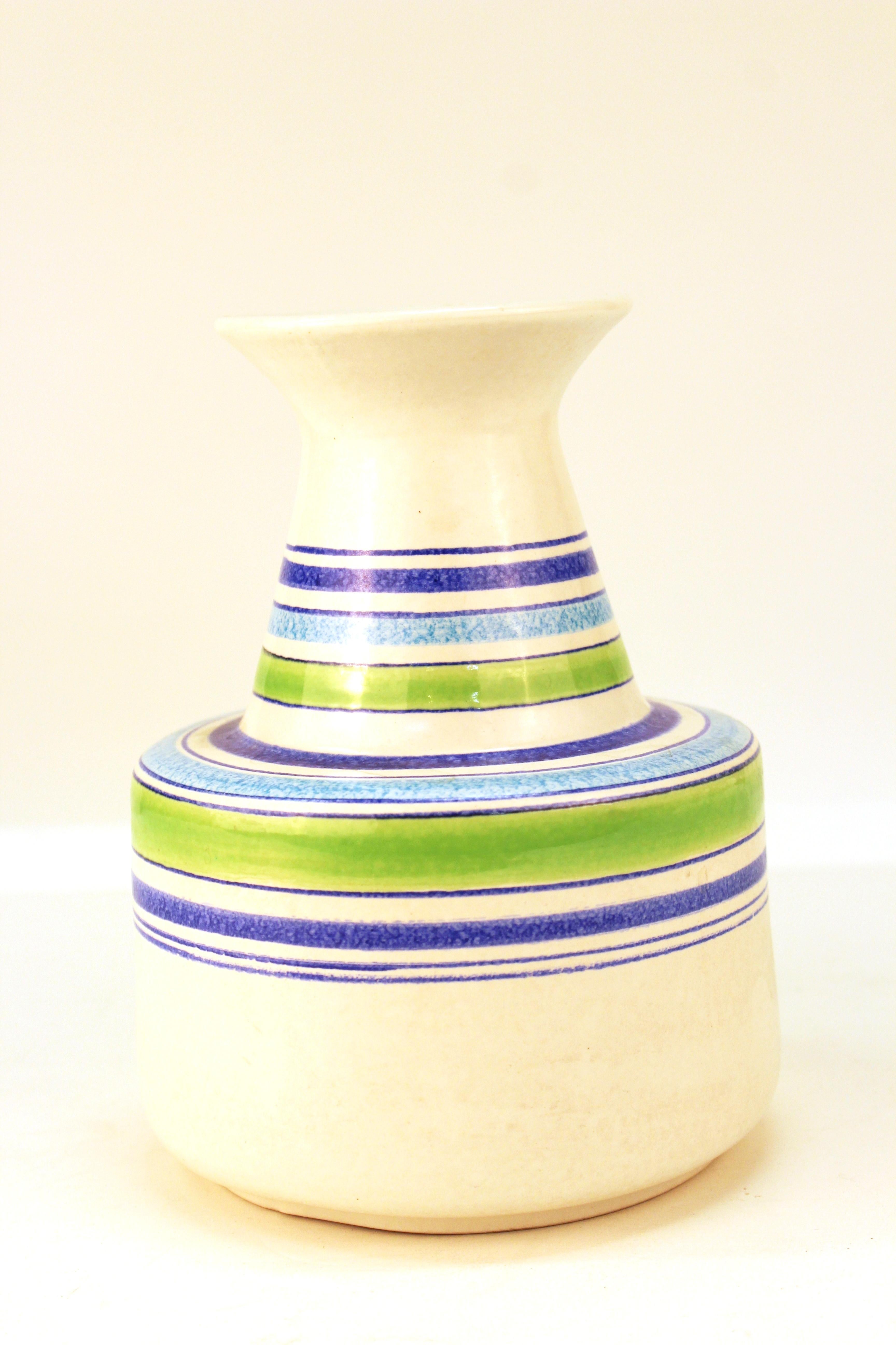 Mid-Century Modern ceramic vase with striped multi-color design, made by Aldo Londi for Raymor for Bitossi Rosenthal Netter in Italy in the 1960s. The piece is labeled on the bottom, with a number and is in great vintage condition.