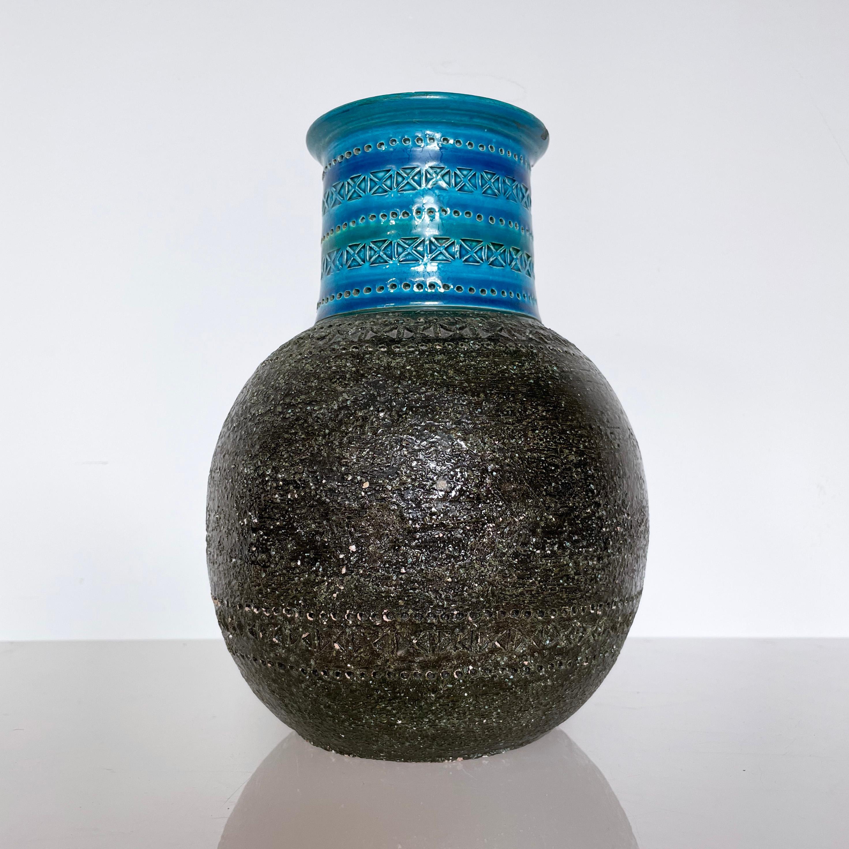 Late 1950’s - early 1960’s Aldo Londi Rimini Blue Vase for Bitossi, Italy. Numbered on base: 102/23 ITALY
Designer: Aldo Londi, Italy
Producer: Bitossi, Italy
Measurements: Height: 23 cm  Diameter: 18 cm
Condition: Very good. Very small chip to the