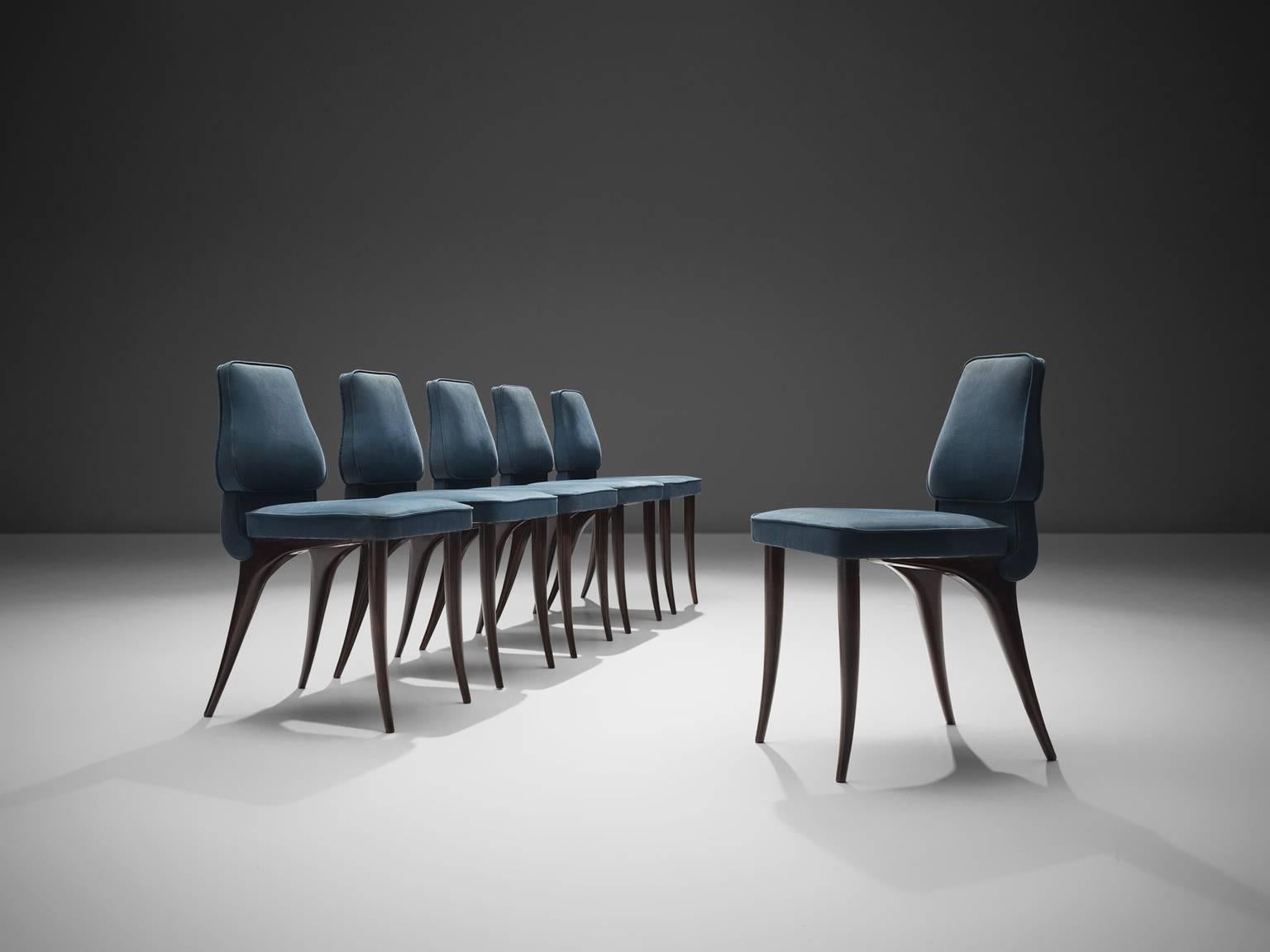 Aldo Morbelli for Colli, set of six dining chairs with blue fabric lining and mahogany legs, Italy, 1960s. 

These frivolous chairs have square seats and freeform shaped backs. They are elegant chairs with low backs that feature a beautiful