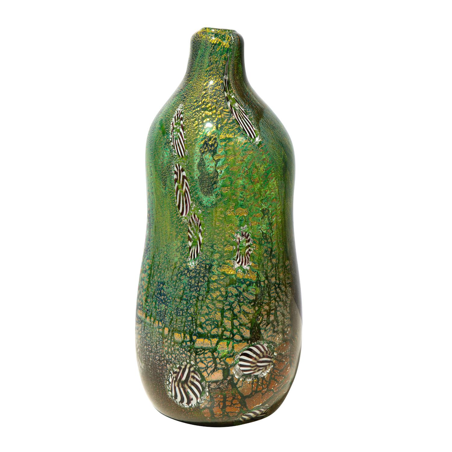 Hand-blown glass vase with undulating form from the Yokohama Series, green glass with murrhines and silver foil, by Aldo Nason for Arte Vetraria Muranese (A.V.E.M.), Murano Italy, 1960's (signed on bottom “Nason Aldo for Carlo Dedy”). Nason, who