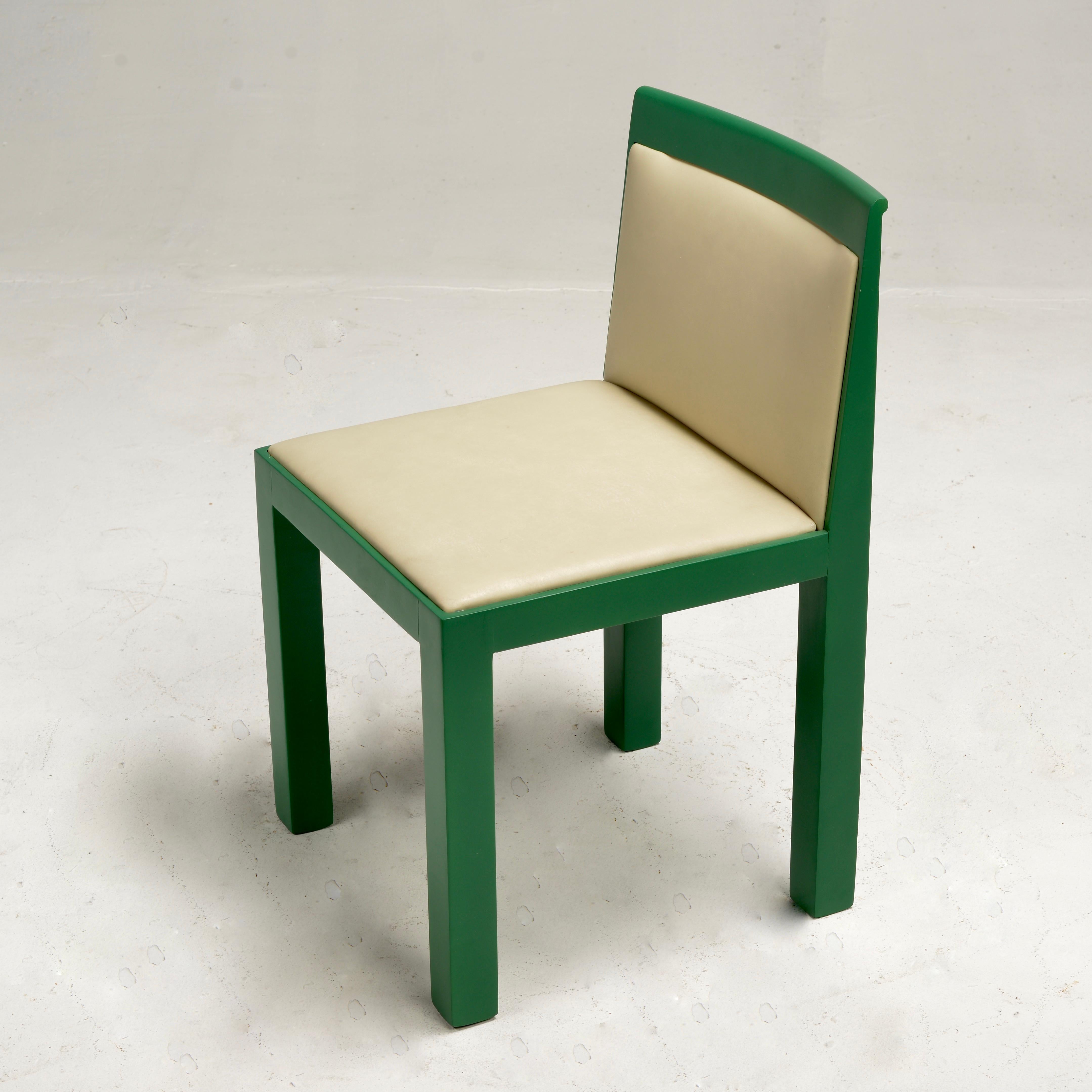 Post-Modern 'Teatro' side chairs in solid beech wood designed by architect Aldo Rossi and Luca Meda and manufactured by Italian furniture company Molteni circa 1980s. These beautiful and timeless chairs feature a minimalist, geometric design with