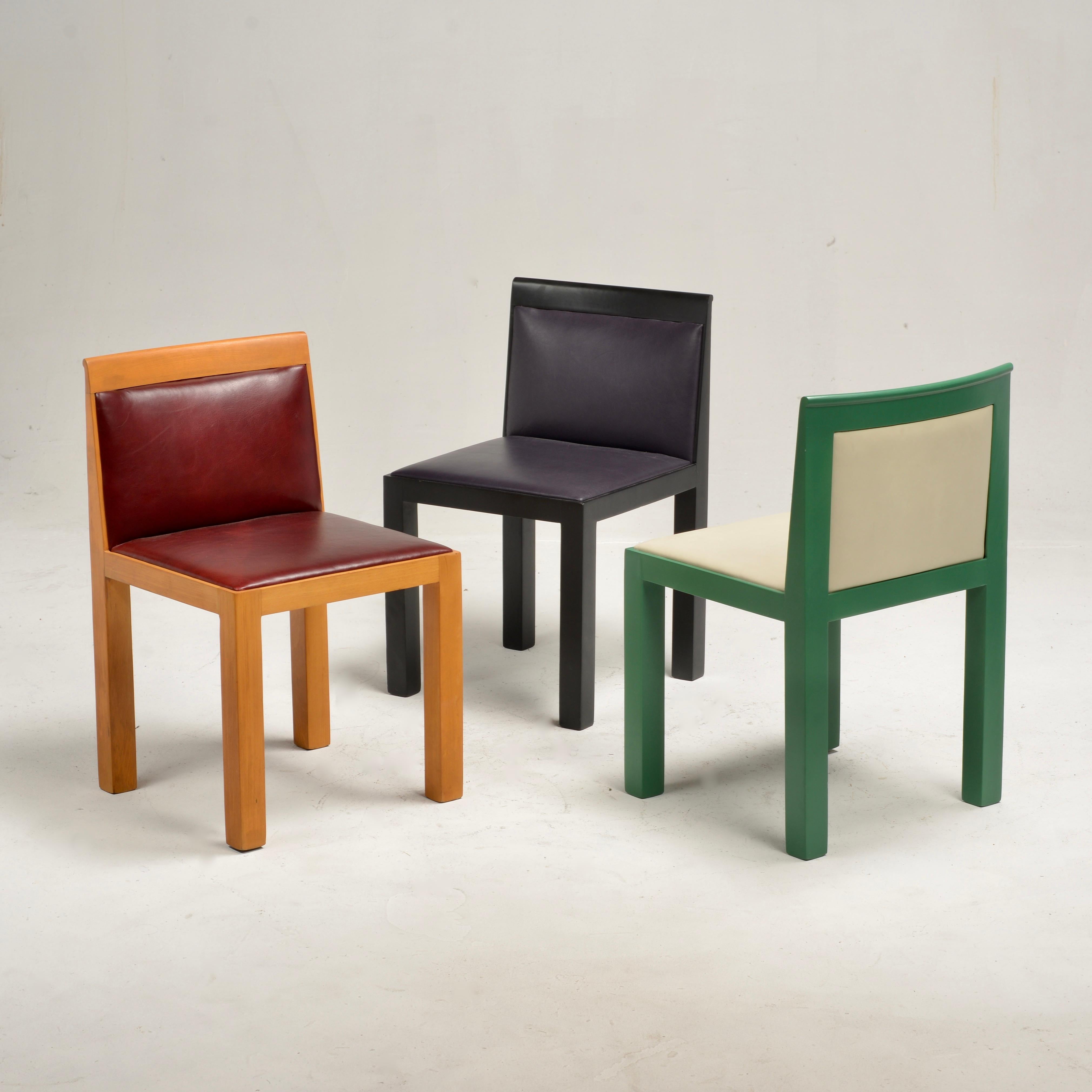 Post-Modern 'Teatro' side chairs in solid beech wood designed by architect Aldo Rossi and Luca Meda and manufactured by Italian furniture company Molteni circa 1980s. These beautiful and timeless chairs feature a minimalist, geometric design with