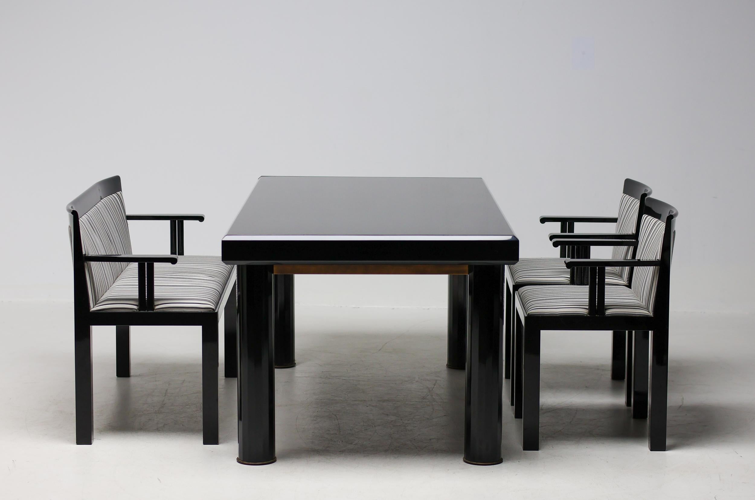 Exceptional Post-Modern Teatro dining set designed by architect Aldo rossi and Luca Meda and produced by Italian furniture company Molteni.  Beautiful timeless design in high quality gloss lacquered wood and original fabric upholstery in exceptional