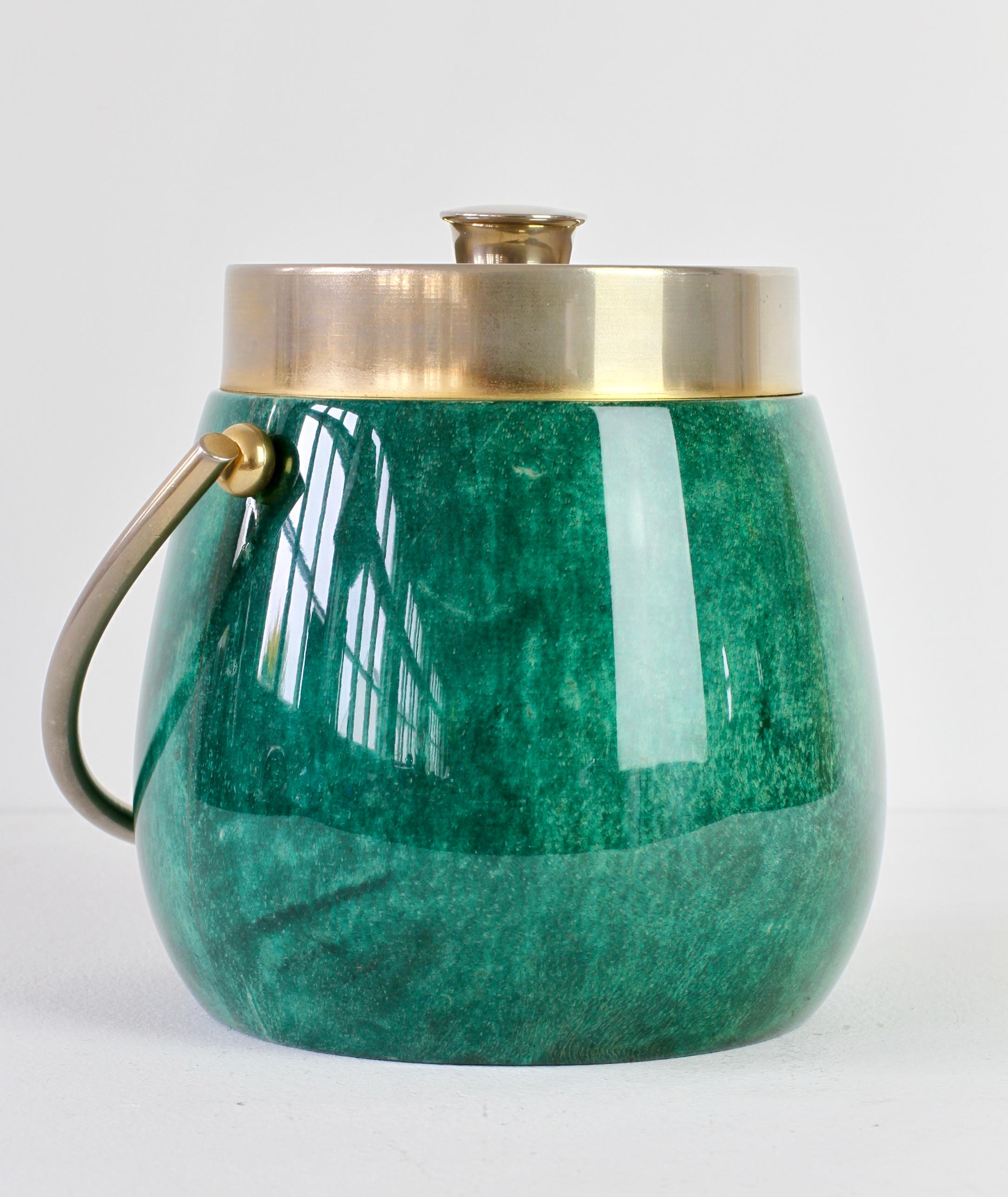 Midcentury Italian 1960s ice bucket or ice-cube holder by Aldo Tura, Milan. Signed with original label, green colored and lacquered goatskin leather combined with cast metal carrier or handle is perfect for carrying ice to your guests - perfect with