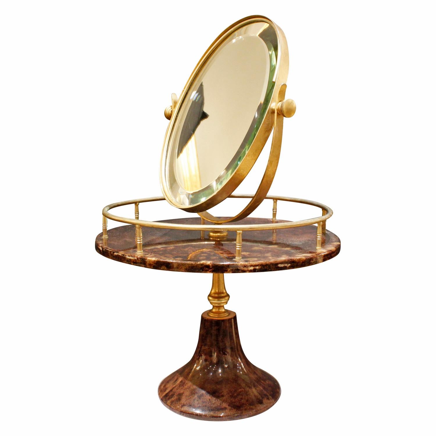 Adjustable vanity mirror with base in lacquered chocolate goatskin with gold-plated hardware by Aldo Tura, Milan Italy, 1970s (signed on bottom). This piece is rare and very luxurious.