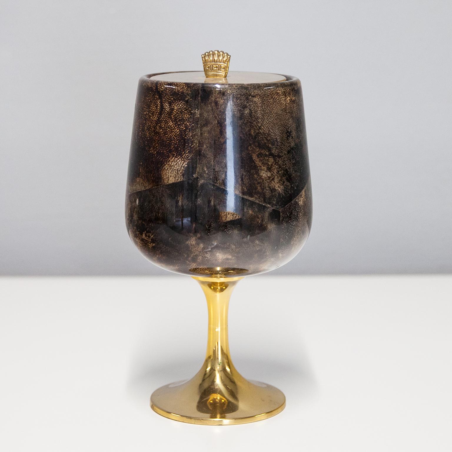 Wonderful ice bucket by Aldo Tura in brown parchment and a glass inlay, in excellent vintage condition. Along with artists like Piero Fornasetti and Carlo Bugatti, Aldo Tura (1909-1963) definitely belonged to the mavericks of Italian design. Where