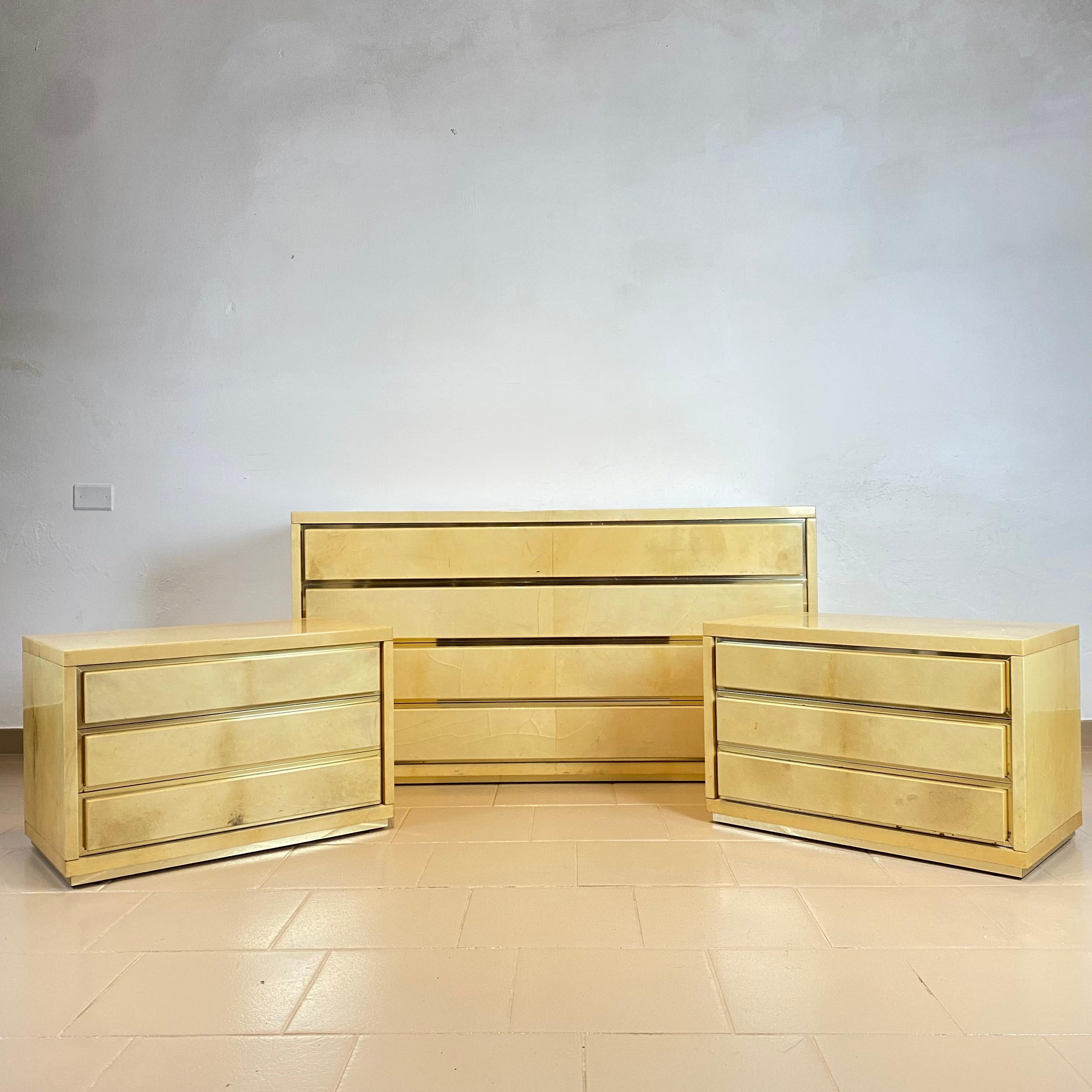 Aldo Tura chest of drawers and a pair of nightstands in Parchment and Brass, Italy 1960s.
 
Elegant Aldo Tura's Chest of Drawers with four drawers and a pair of Luxurious Nightstands with three drawers completly made in light skin Parchment and