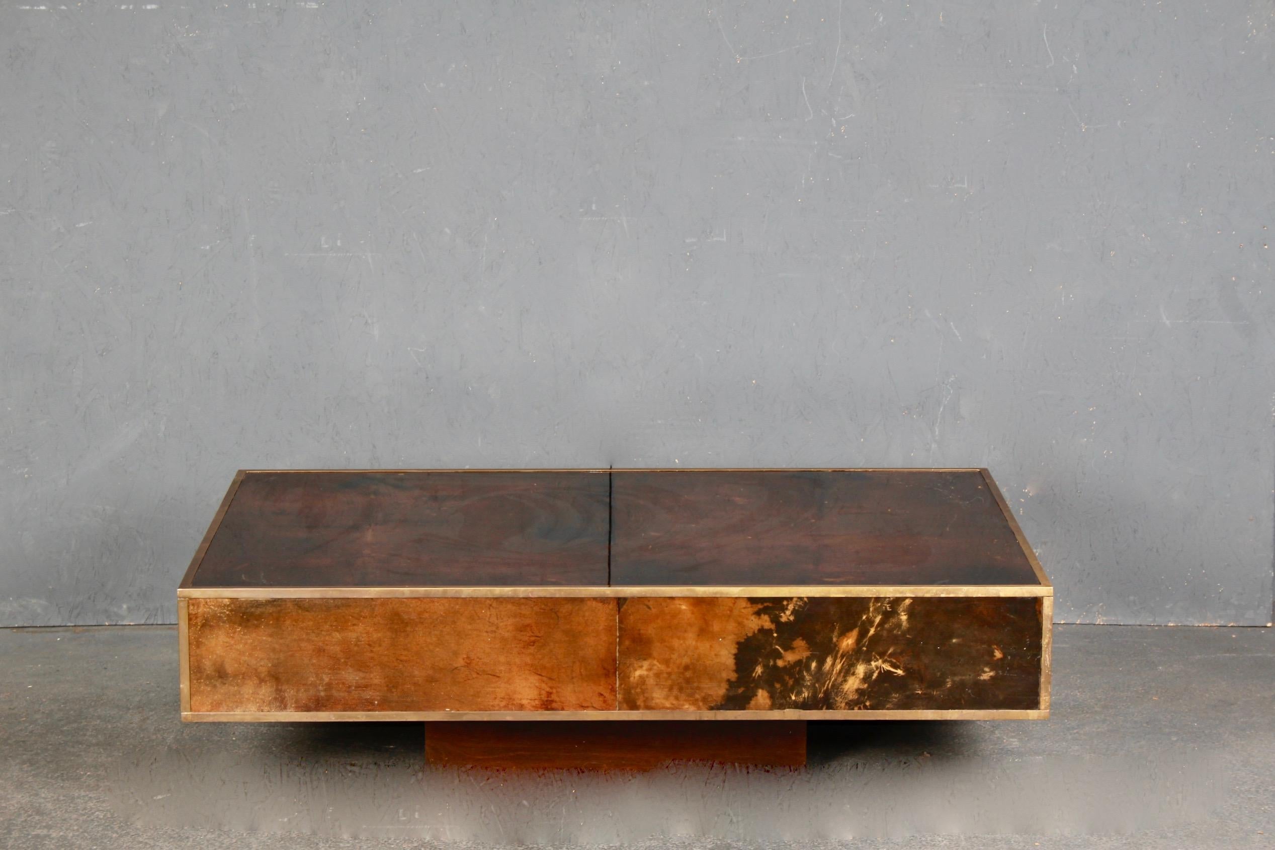 Aldo Tura parchment coffee table , there are two small lacks of varnish on the top of the table