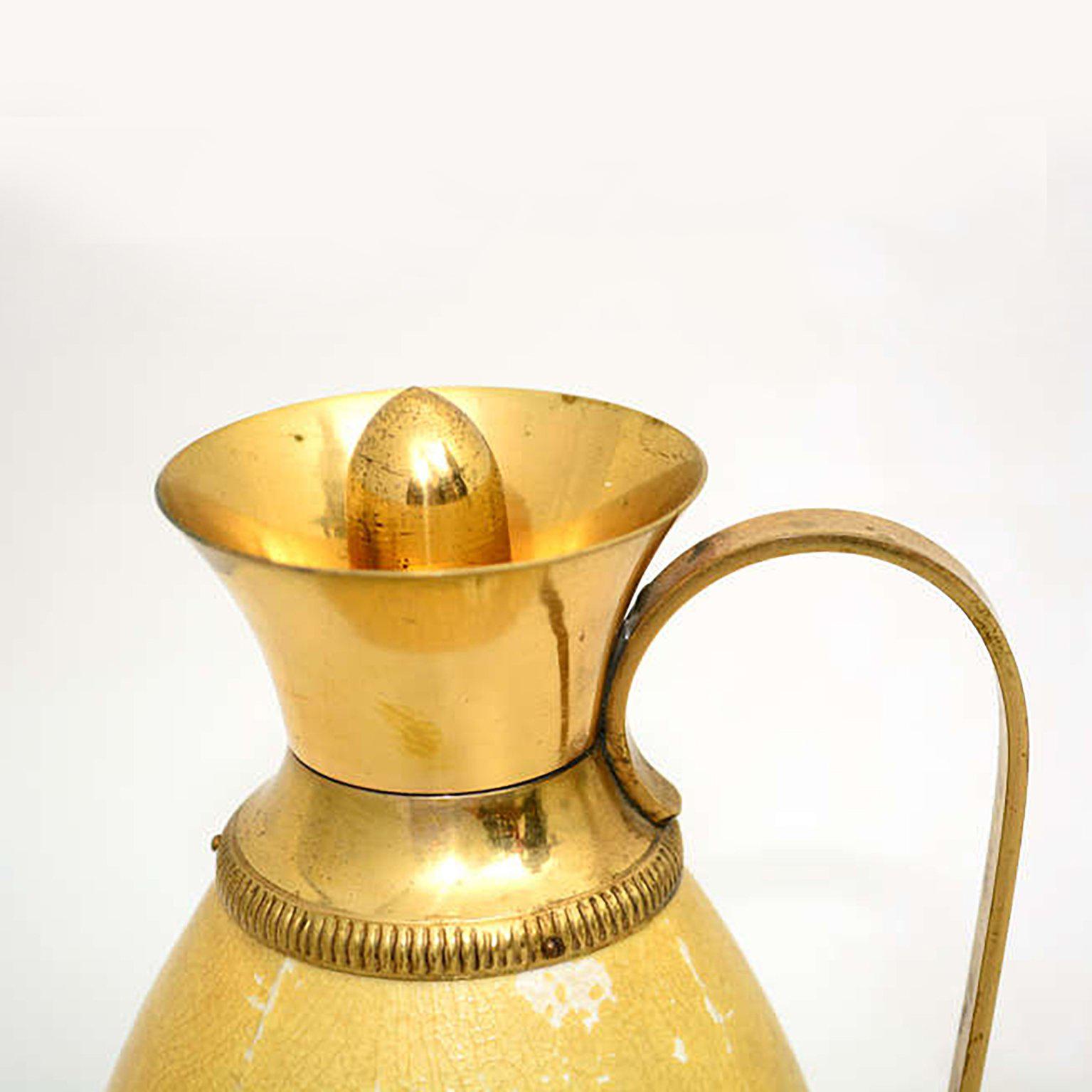 Aldo Tura made in Italy by Macabo circa 1940s
Goatskin Parchment and Brass lovely vintage CARAFE Pitcher ITALY
Carafe with original matching lid exquisite detail
12h x 5 diameter x 6D
Original unrestored finish with patina present.
Parchment with