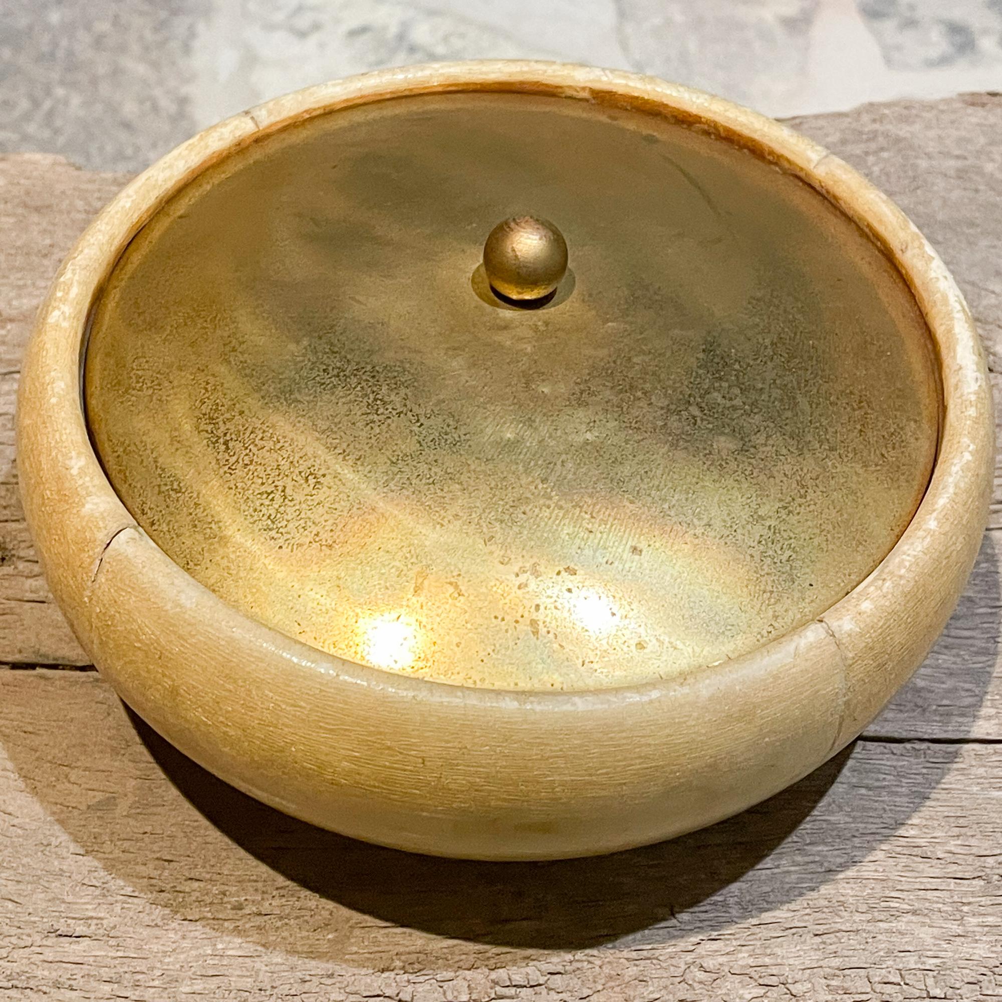 1940s covered dish in lacquered goatskin, parchment and brass.
Aldo Tura made in Italy by Macabo Cusano
2.75 x 6.75
Original vintage condition, unrestored finish with patina present. 
Some areas of lacquer have worn out, providing unique