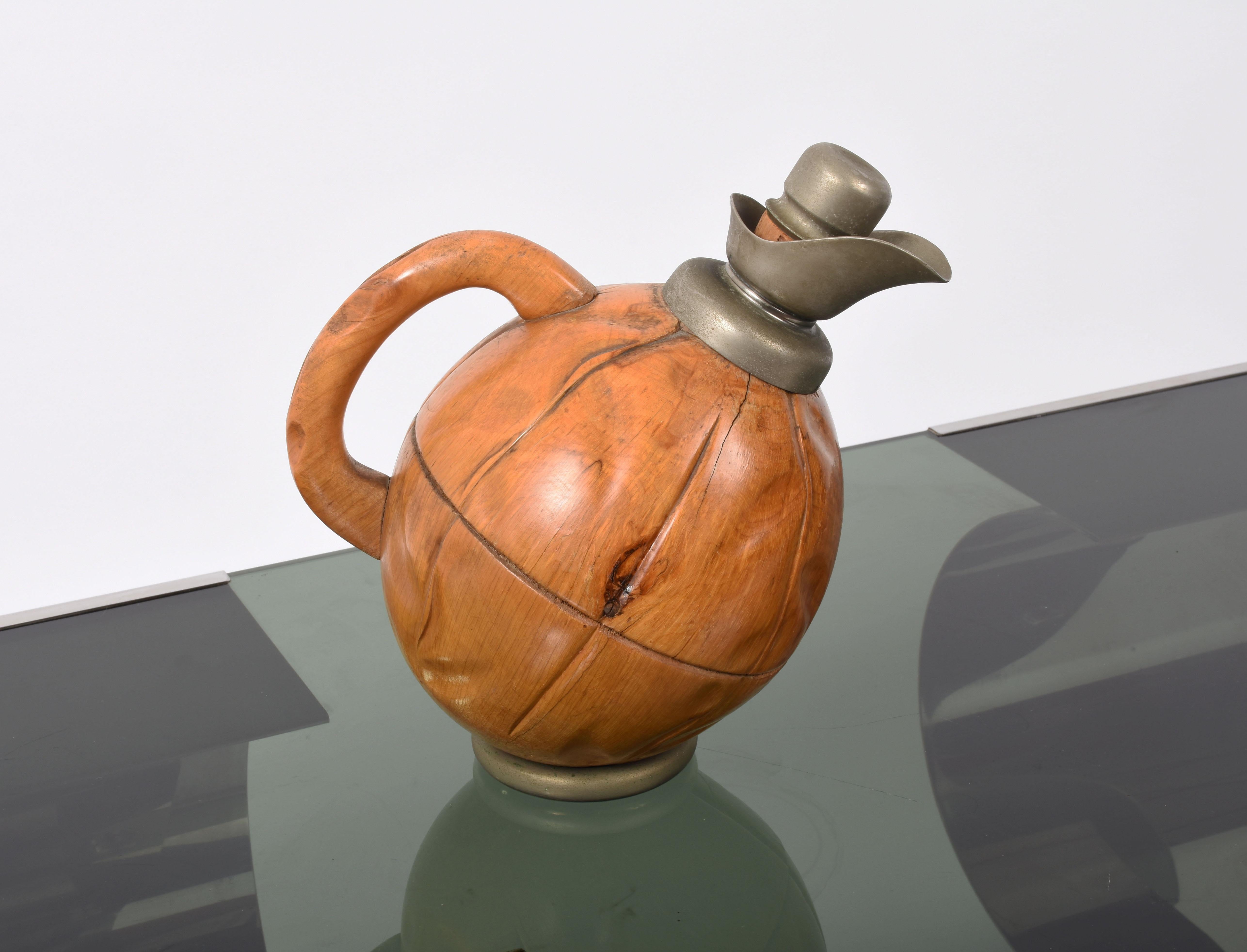 Thermos or Decanter by Aldo Tura for Macabo Cusano Milanino, Milan, Italy, 1950s in carved wood
Measures: 23 x 16 cm.

  