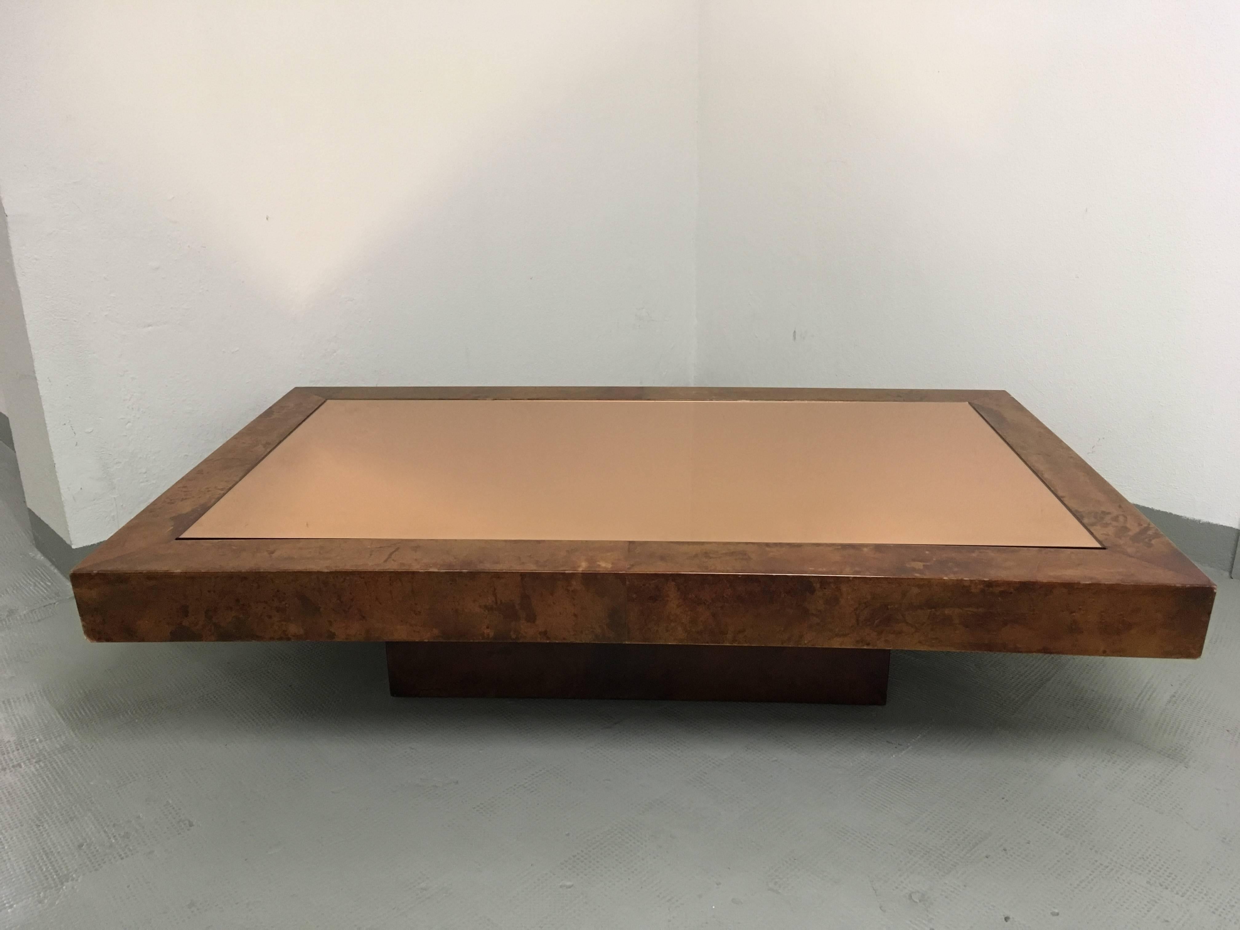 Aldo Tura Goatskin and glass coffee table
Few chips on the edges
Copper color glass top.