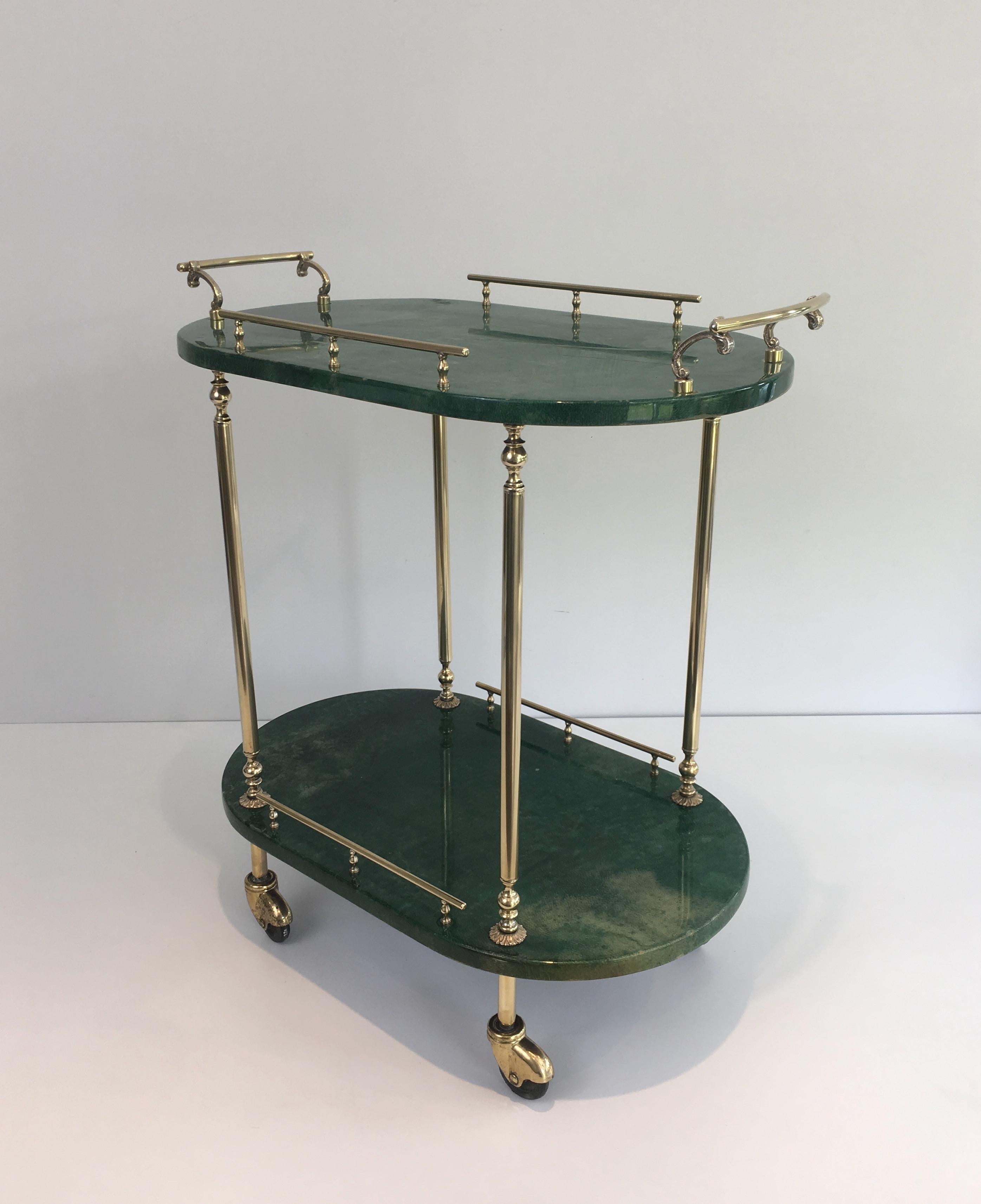 This very nice bar cart is made of goatskin and gilt metal. This is an Italian work by famous designer Aldo Tura, circa 1960.