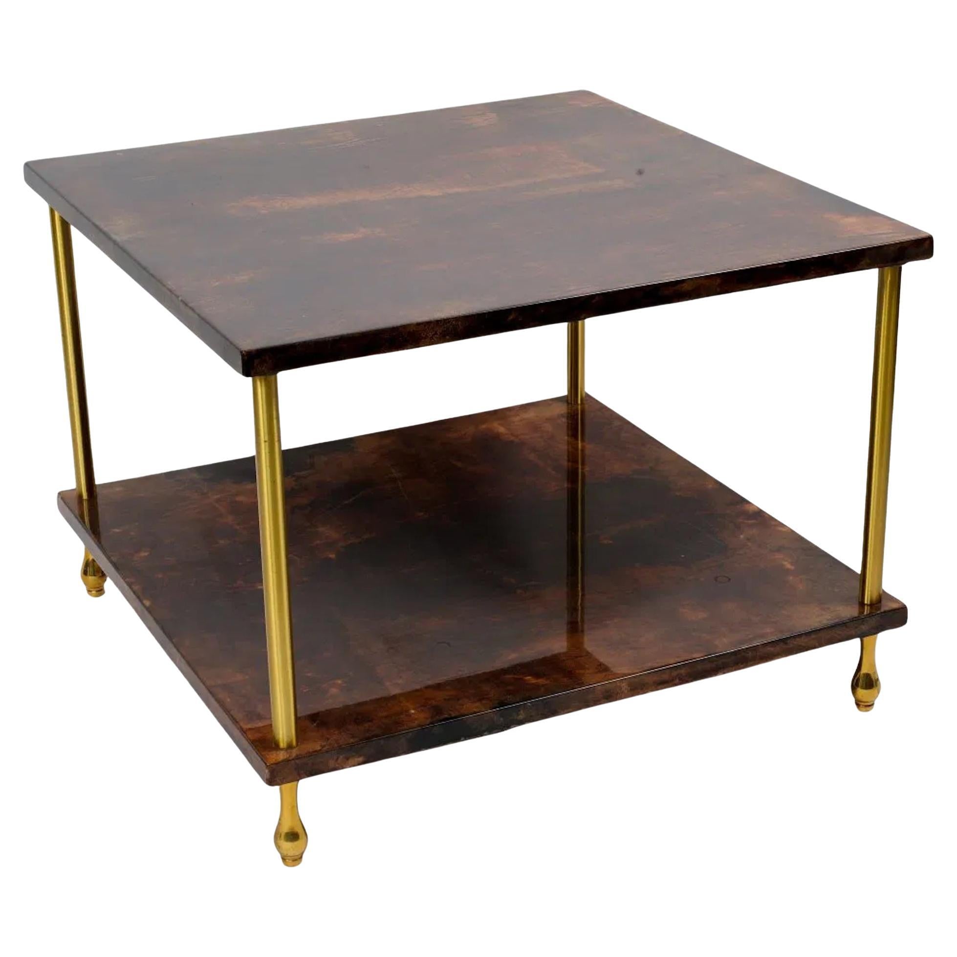 Mesa auxiliar de dos niveles Aldo Tura de piel de cabra de bronce